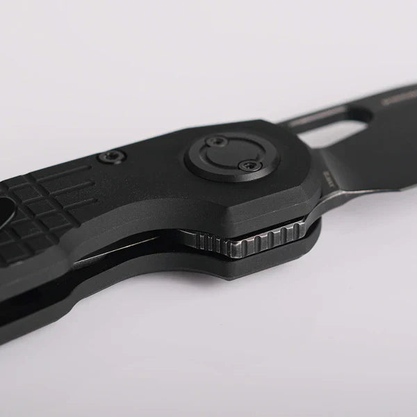Black pocket knife locking mechanism close-up, highlighting the liner lock