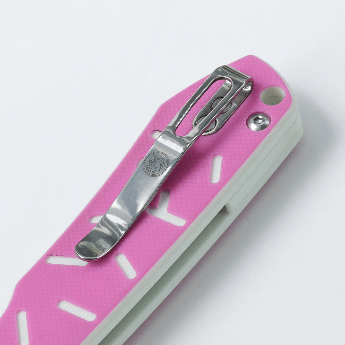 Vosteed Raccoon knife detail: Pink G10 handle and pocket clip
