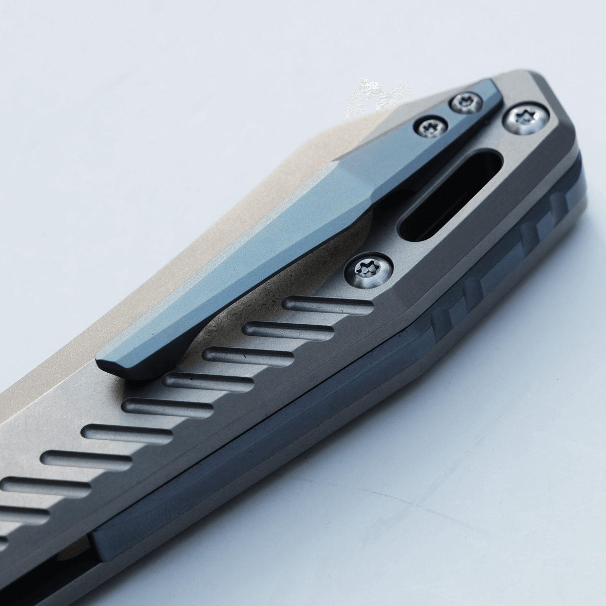 Vosteed RSKAOS knife: Gray Titanium Handle with Blue Clip