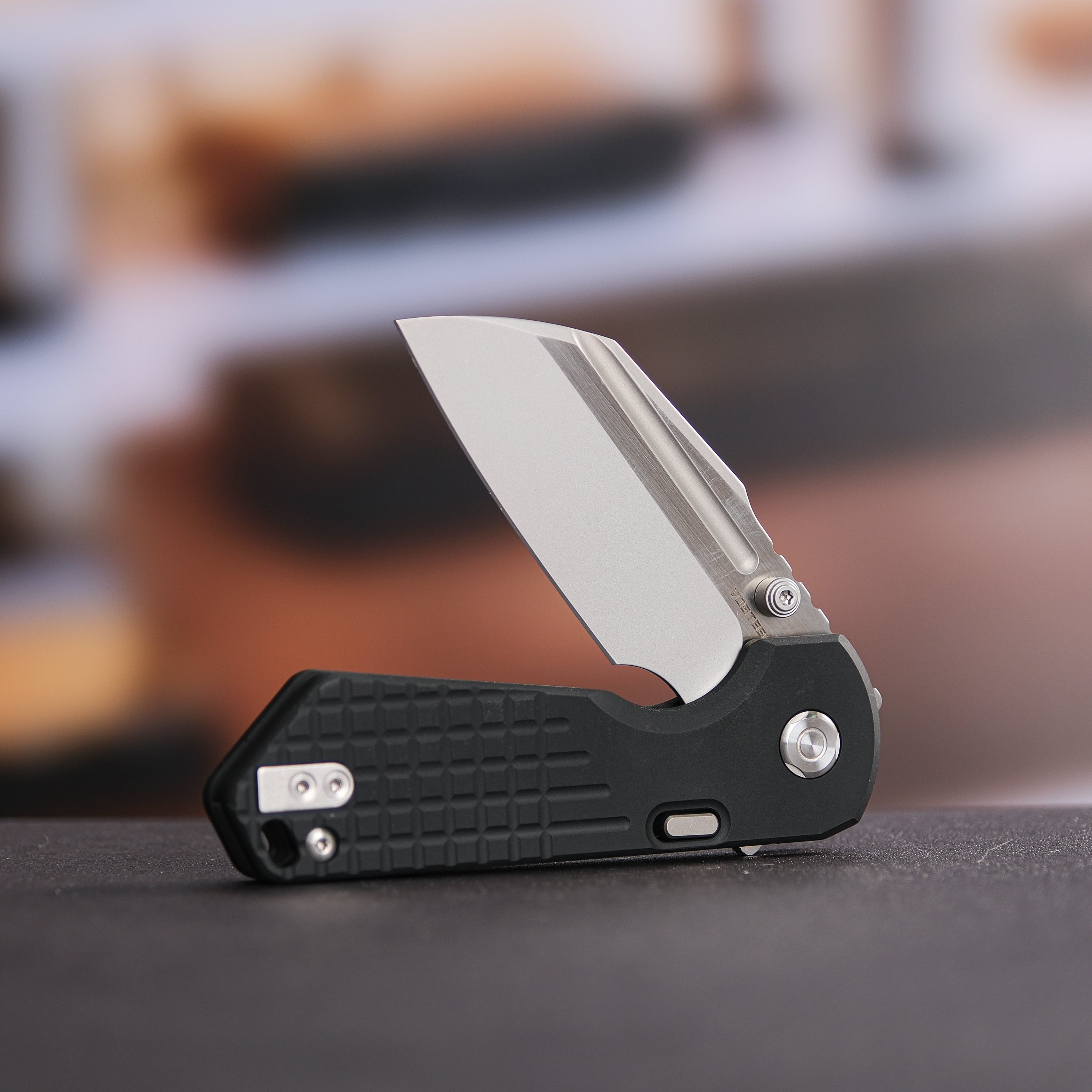 Vosteed Hedgehog knife, blade partially open, black handle