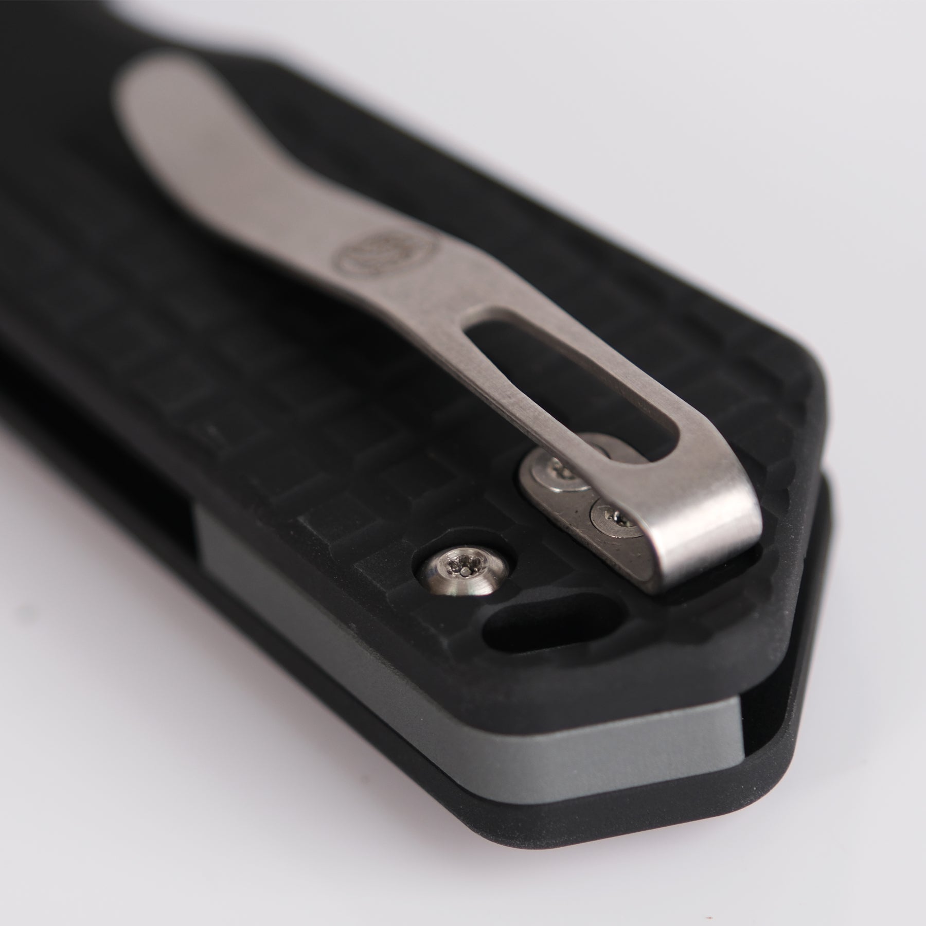 Vosteed Hedgehog knife detail: pocket clip and handle texture