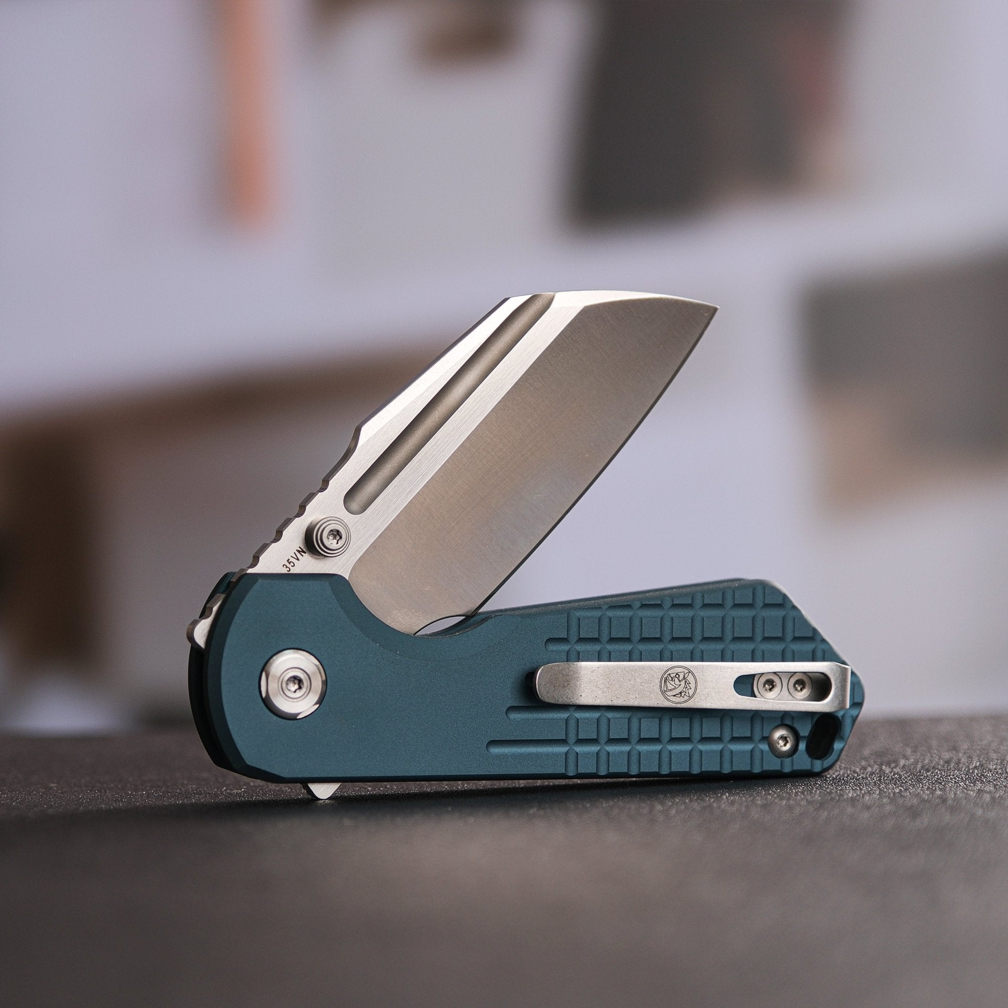 Vosteed Hedgehog knife partially open - blue aluminum handle