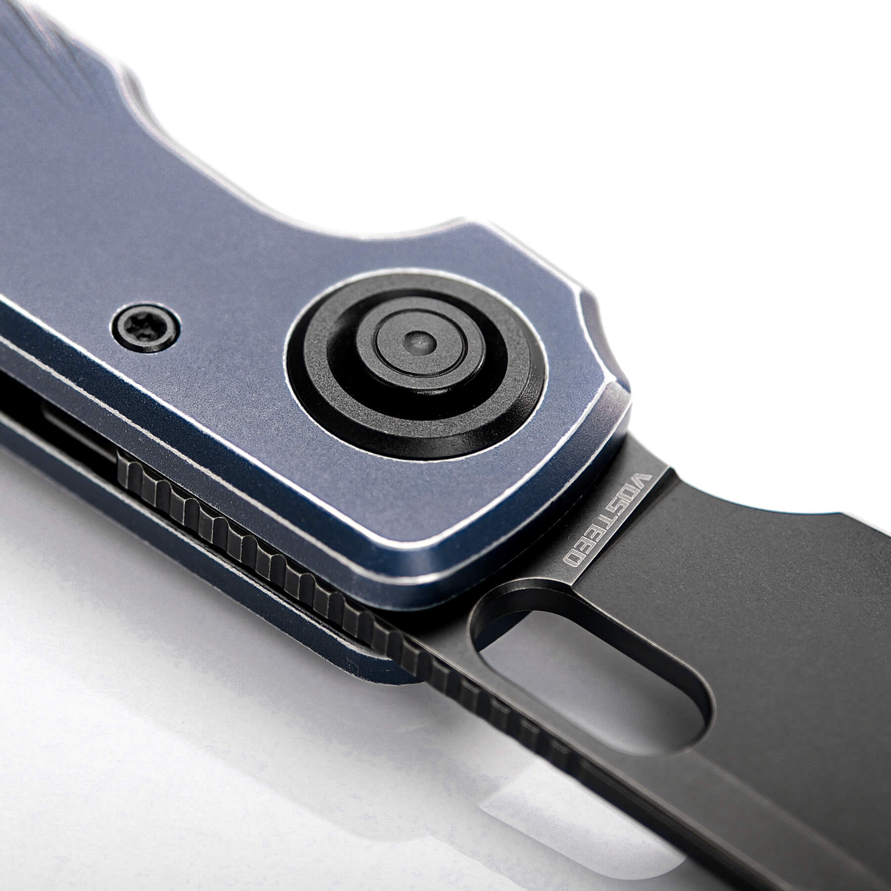 Vosteed Akita knife detail, blue aluminum handle and black blade