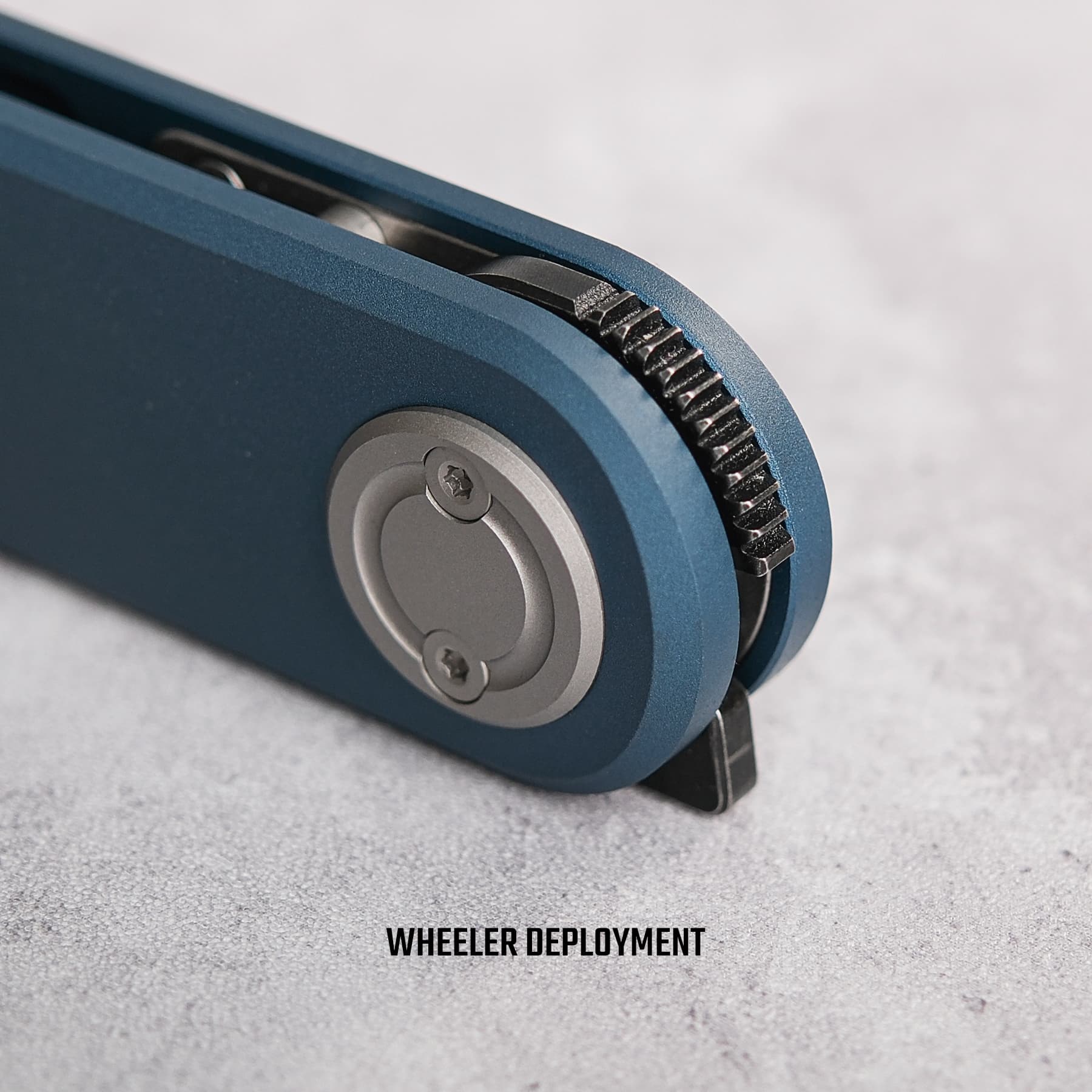 Corgi V knife: Wheeler deployment mechanism, blue handle