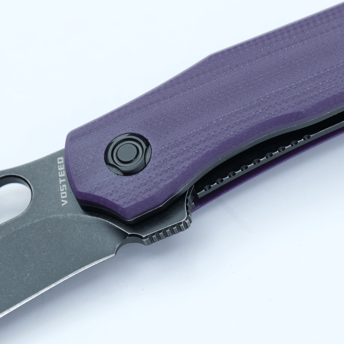 Vosteed Griffin knife detail, purple G10 handle