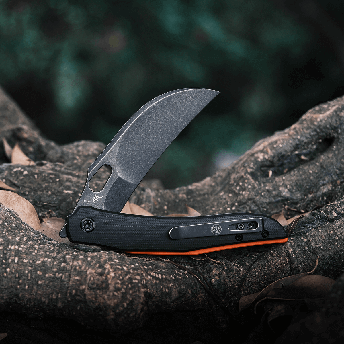 Vosteed Griffin Hawkbill knife open on natural background