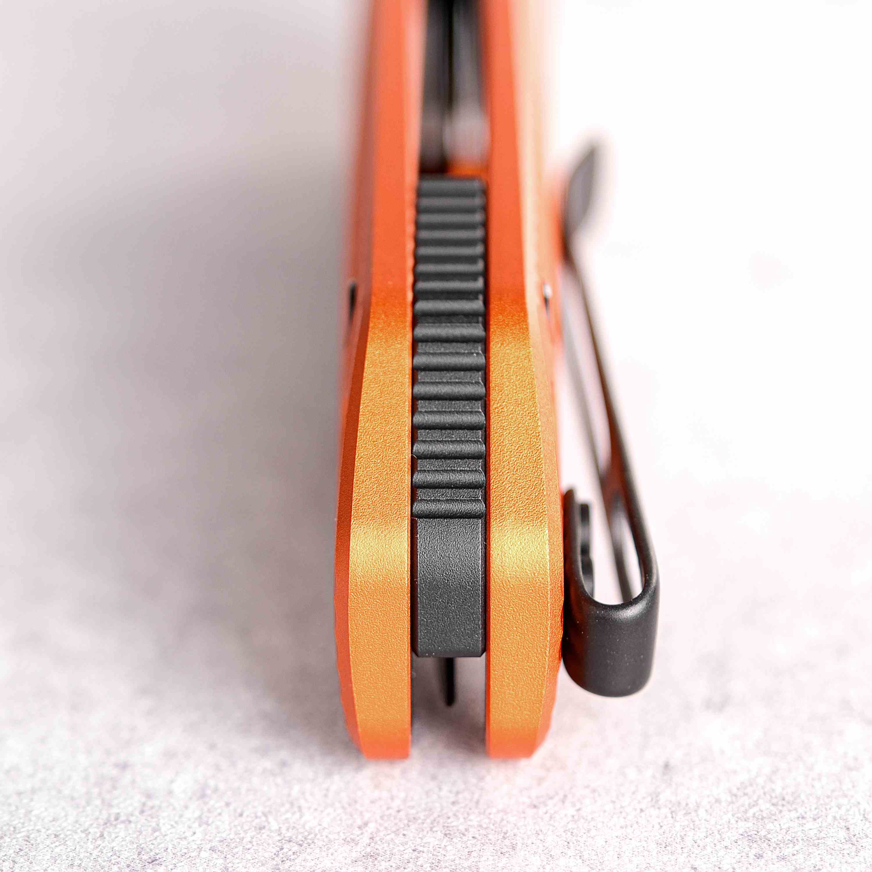 Vosteed Marten knife - Orange handle with black button lock