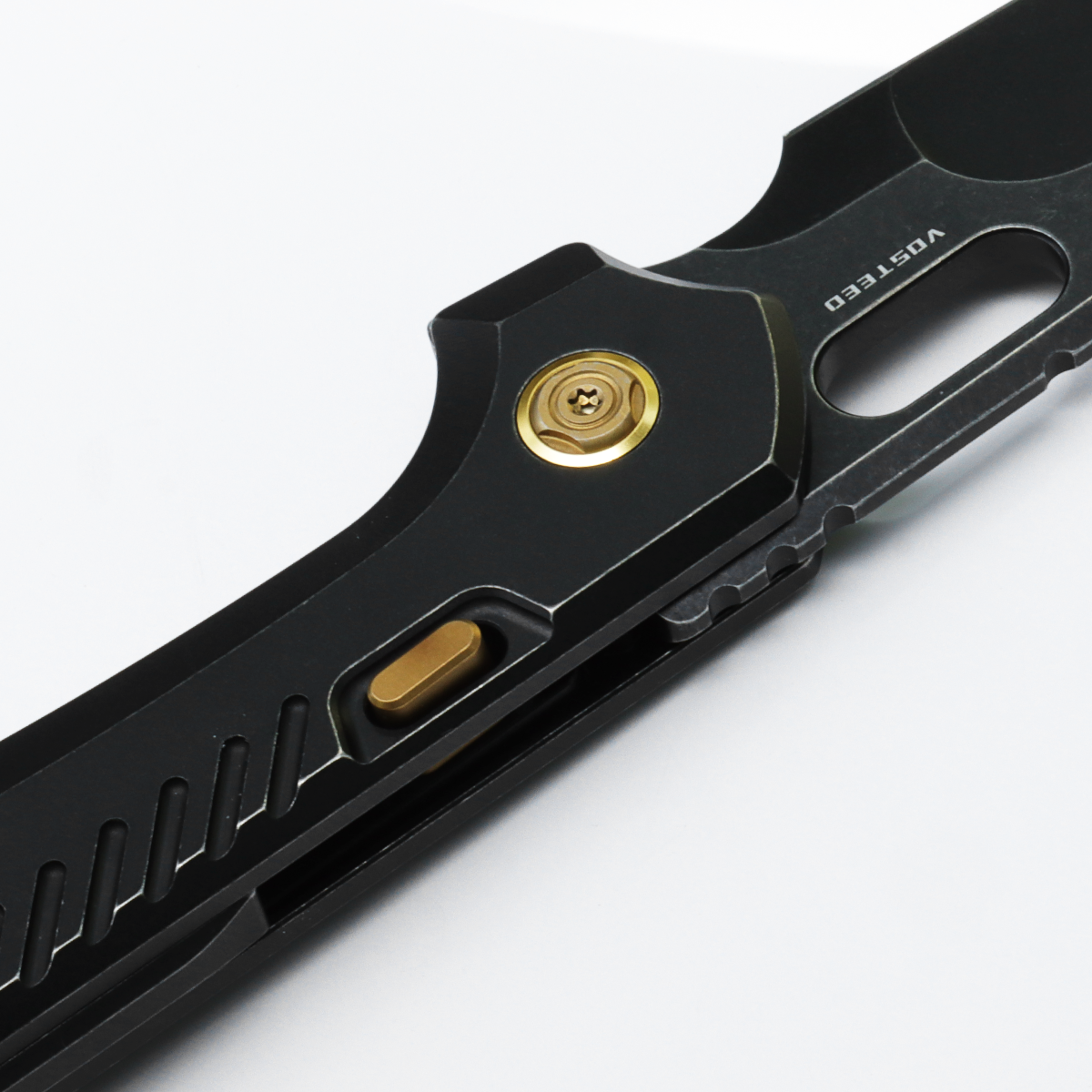 Vosteed RSKAOS knife, close-up black titanium handle