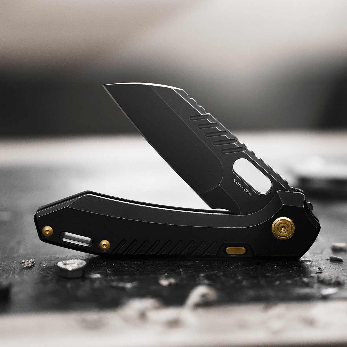 Vosteed RSKAOS knife open, close up, M390 sheepsfoot blade