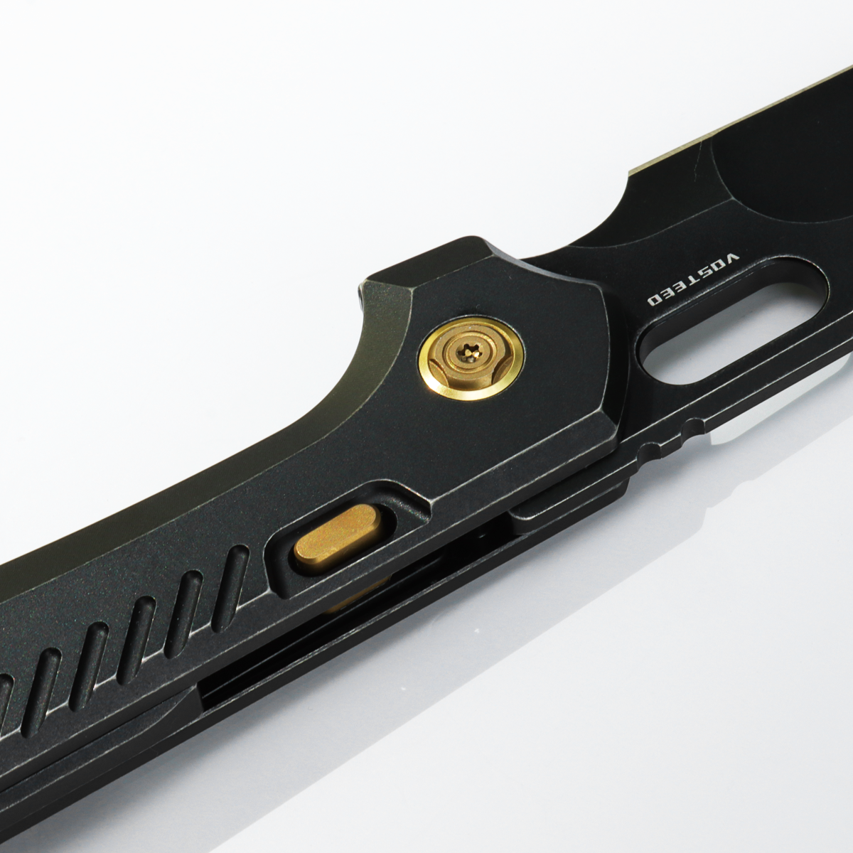 Vosteed RSKAOS Knife Detail: Black Titanium, Gold Hardware