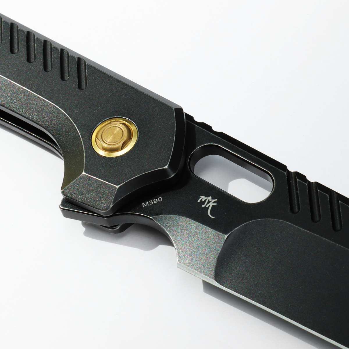 Vosteed RSKAOS Knife detail, M390 blade, black titanium with gold hardware