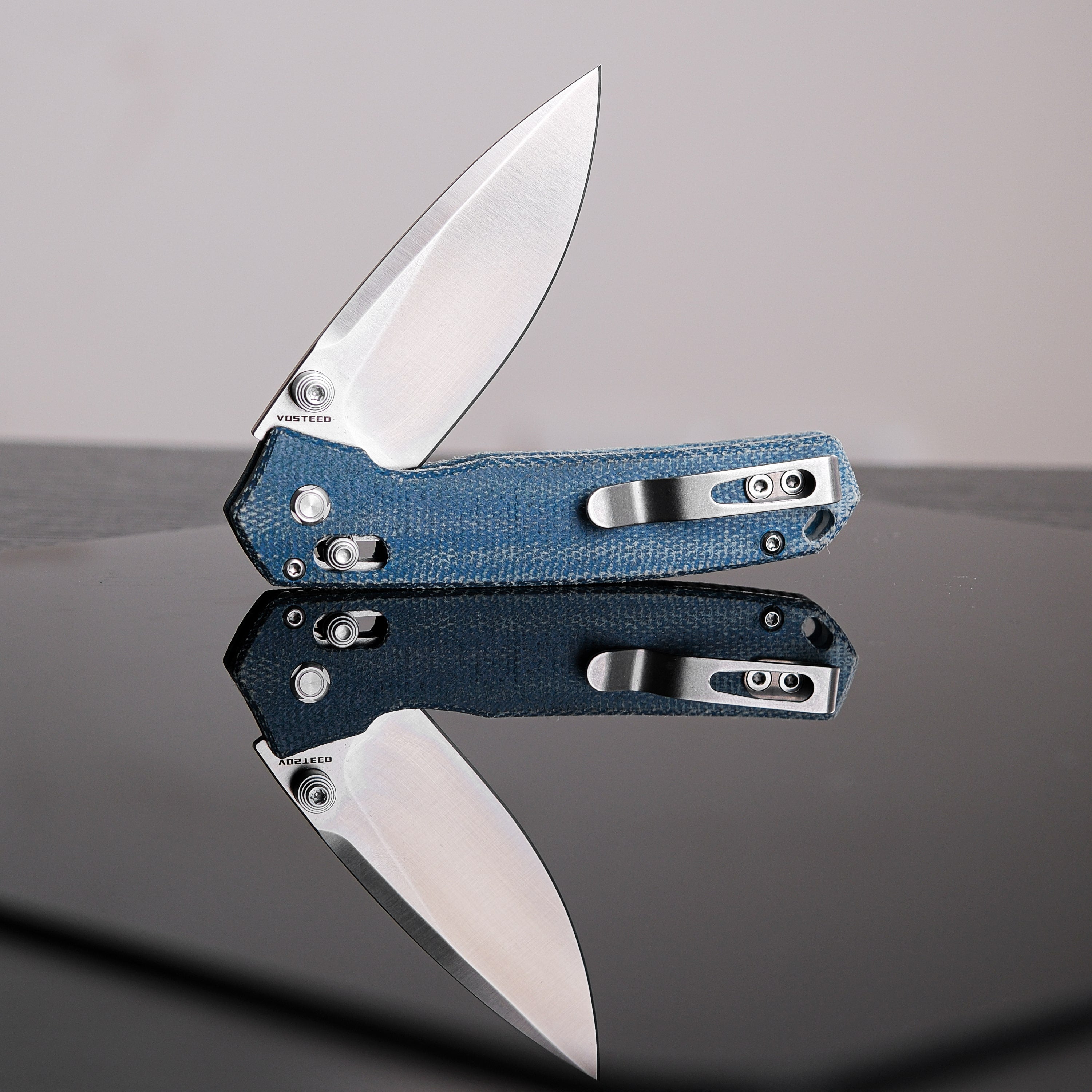 Vosteed Mini Psyop knife, blue Micarta handle with open blade