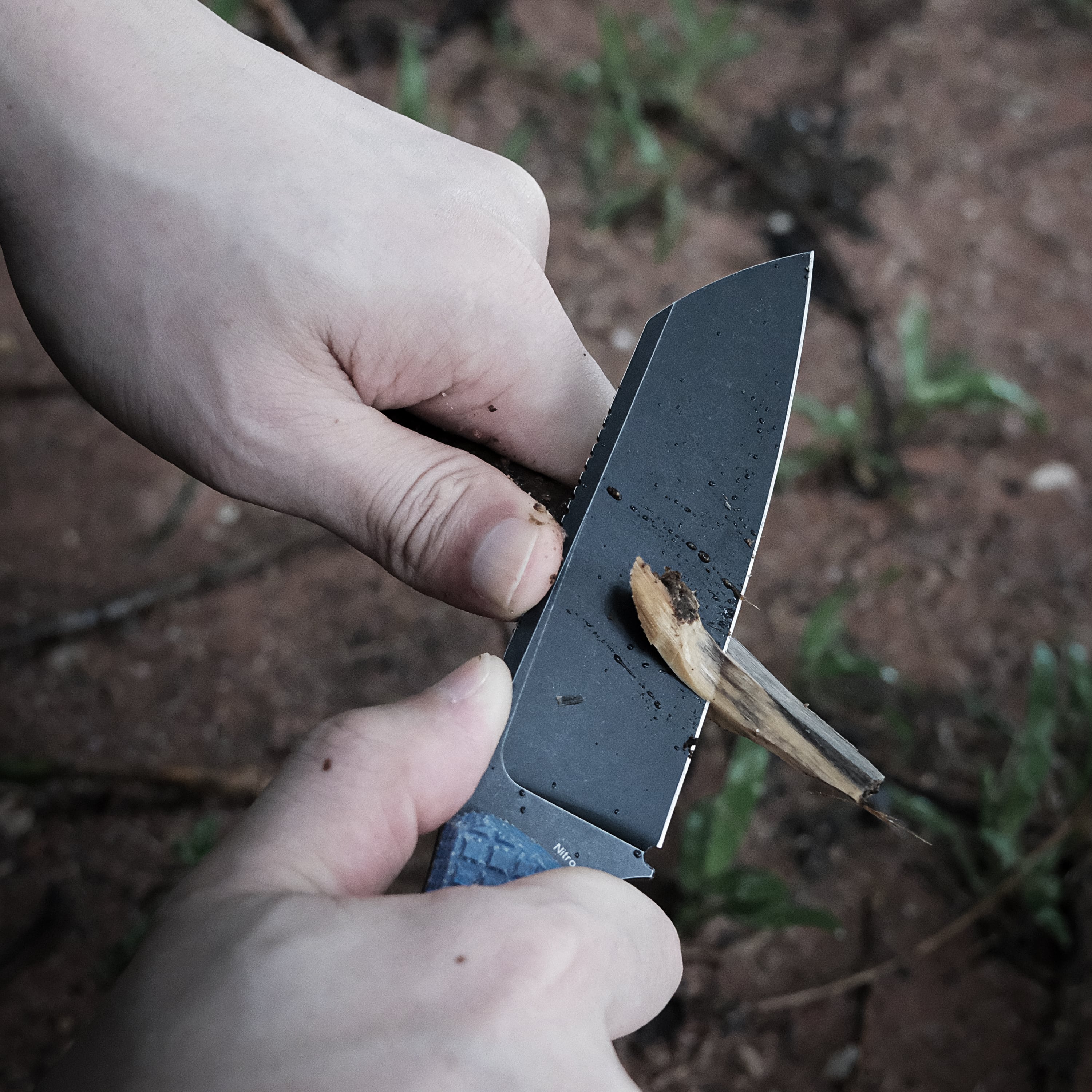 Mink XL fixed blade knife carving wood, outdoor use.