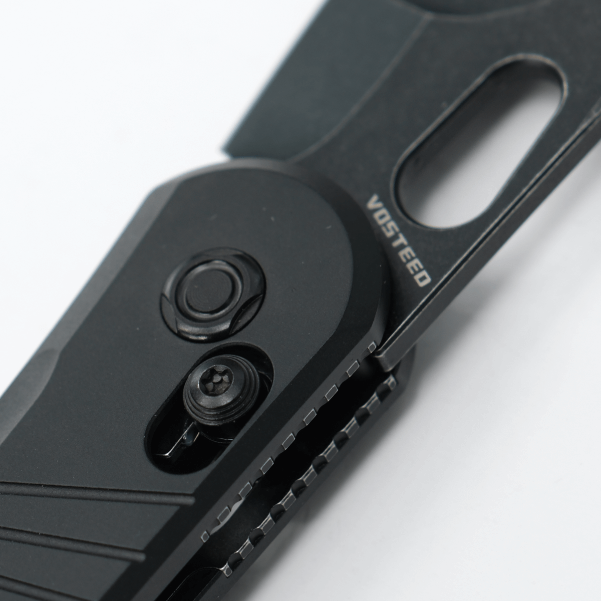 Vosteed Morel Knife detail: Crossbar Lock, Blade, and Logo