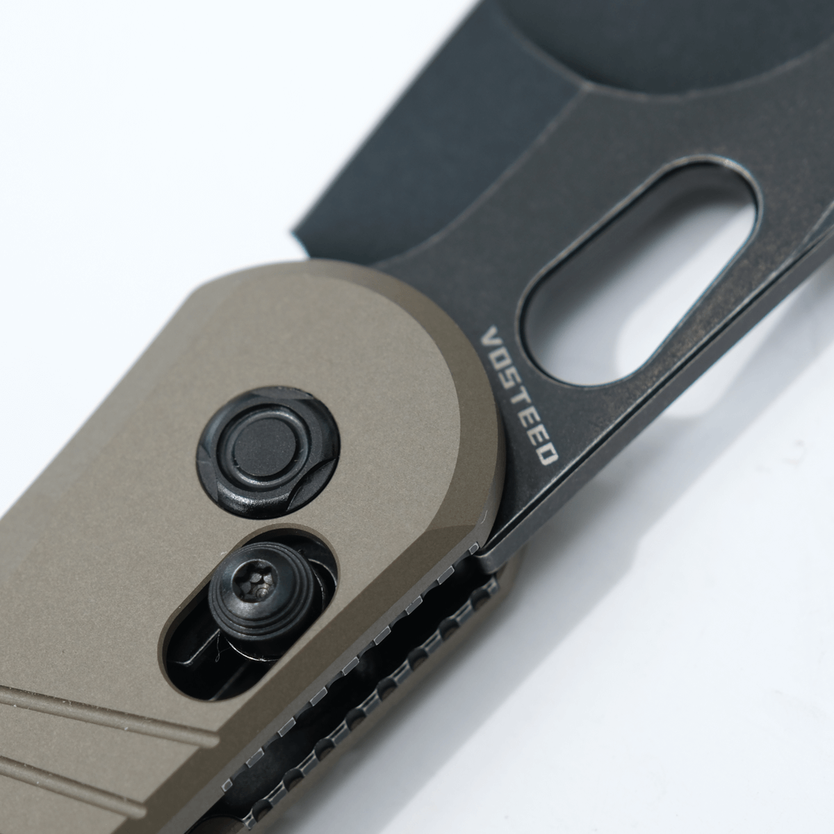 Vosteed Morel knife detail, crossbar lock and logo