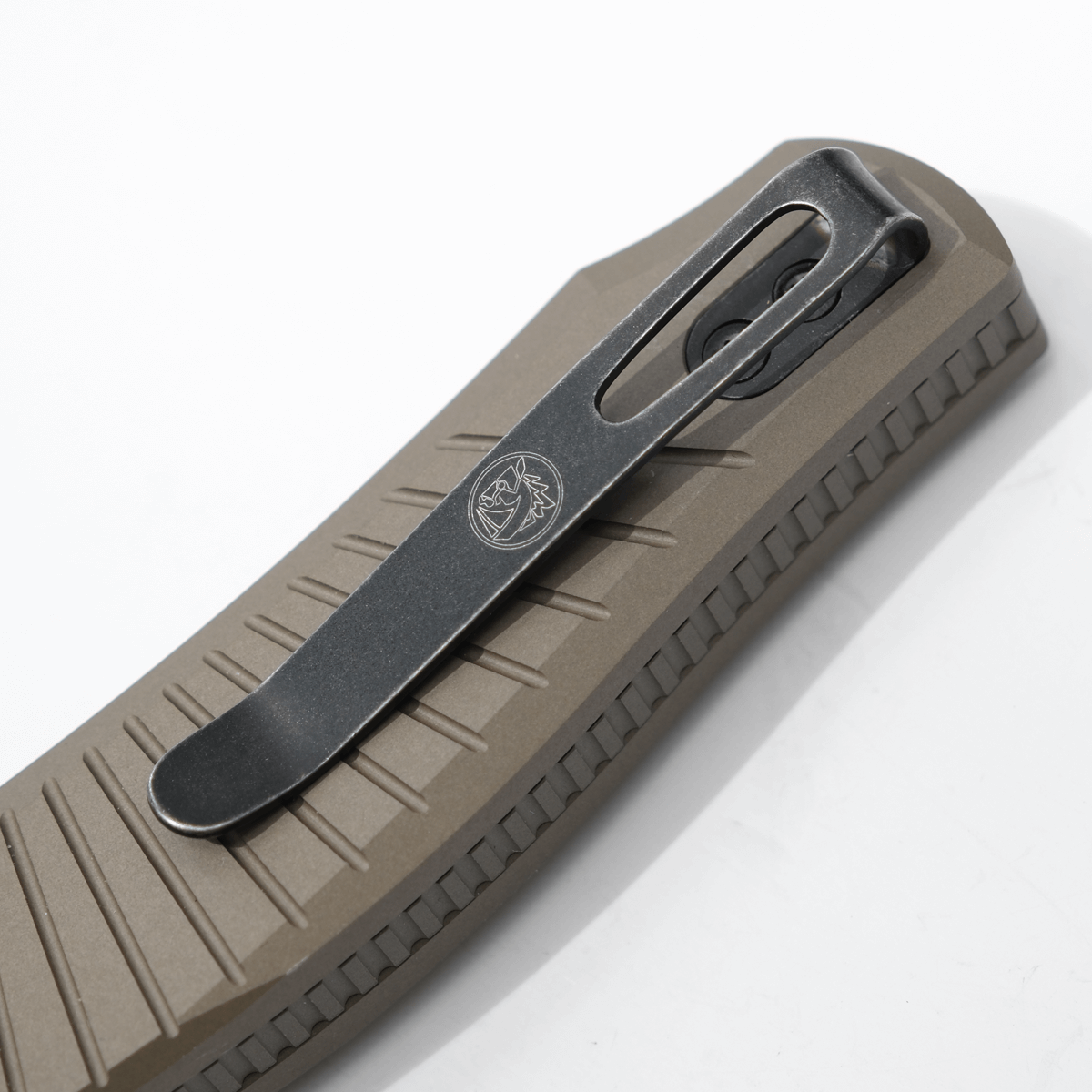 Morel knife pocket clip detail with Vosteed logo