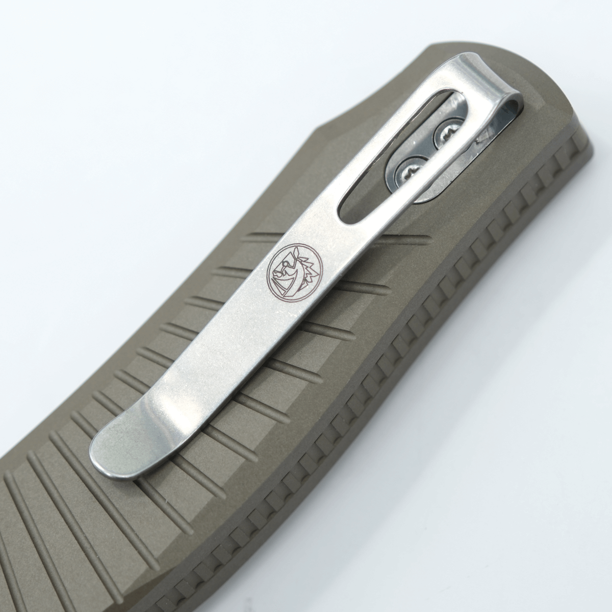 Vosteed Morel knife detail: pocket clip and brown aluminum handle