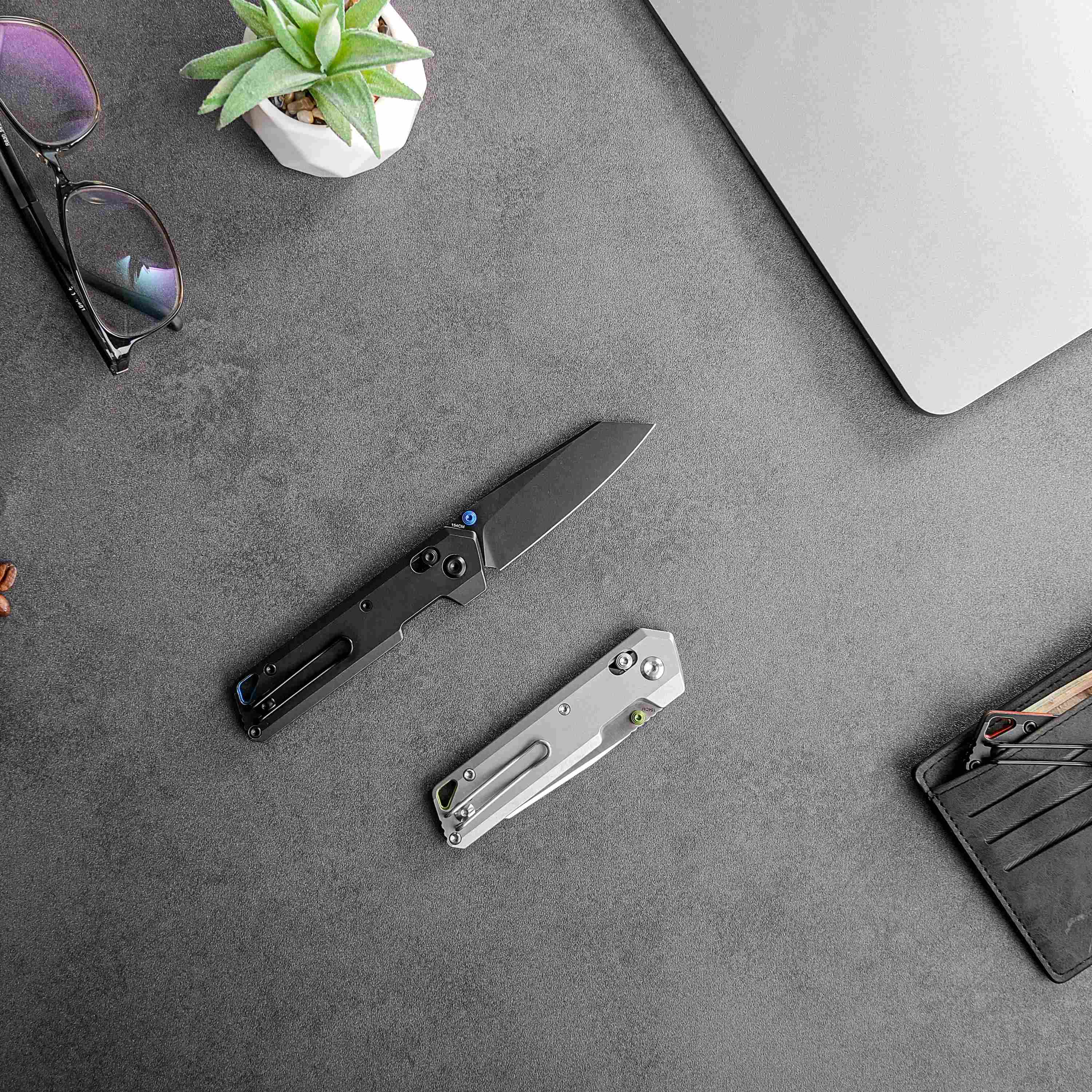 Vosteed Parallel knives with EDC essentials flat lay