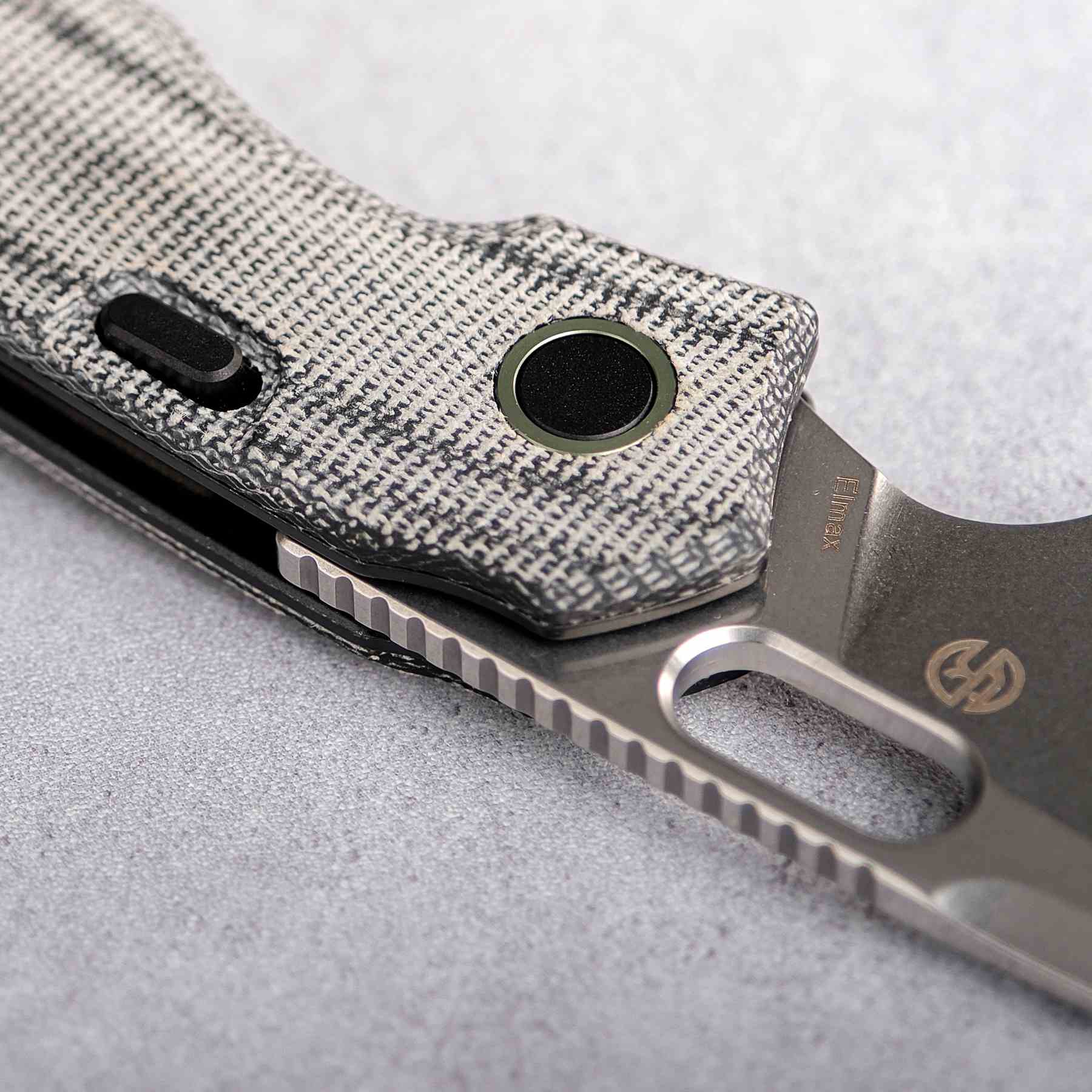 Vosteed Psyop Knife, Micarta handle detail with Elmax blade