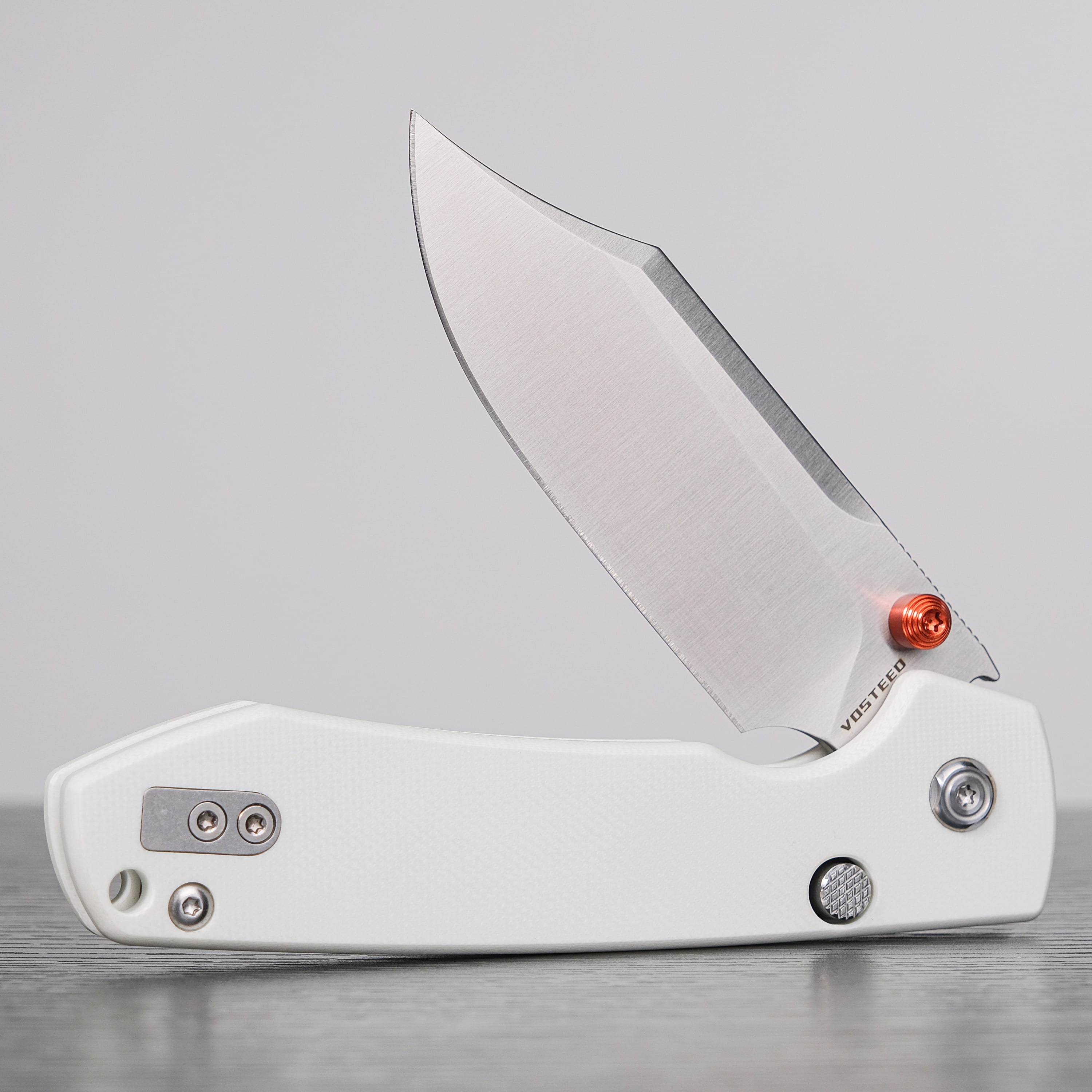 Vosteed Raccoon knife open, bowie blade, white G10 handle