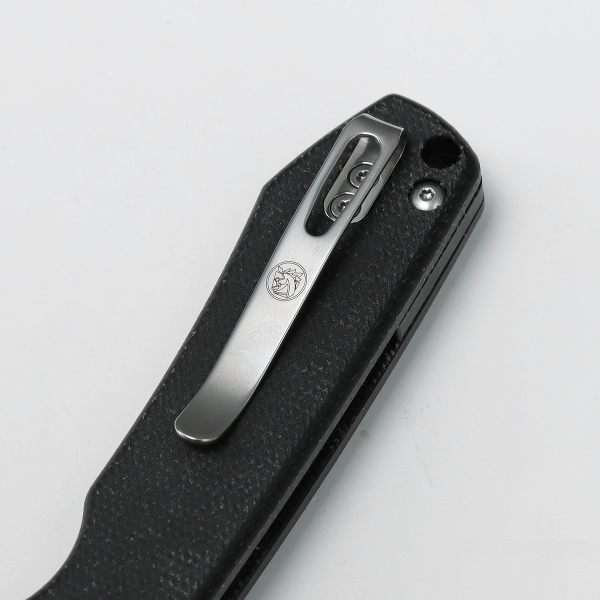 Vosteed Raccoon knife pocket clip and Micarta handle detail