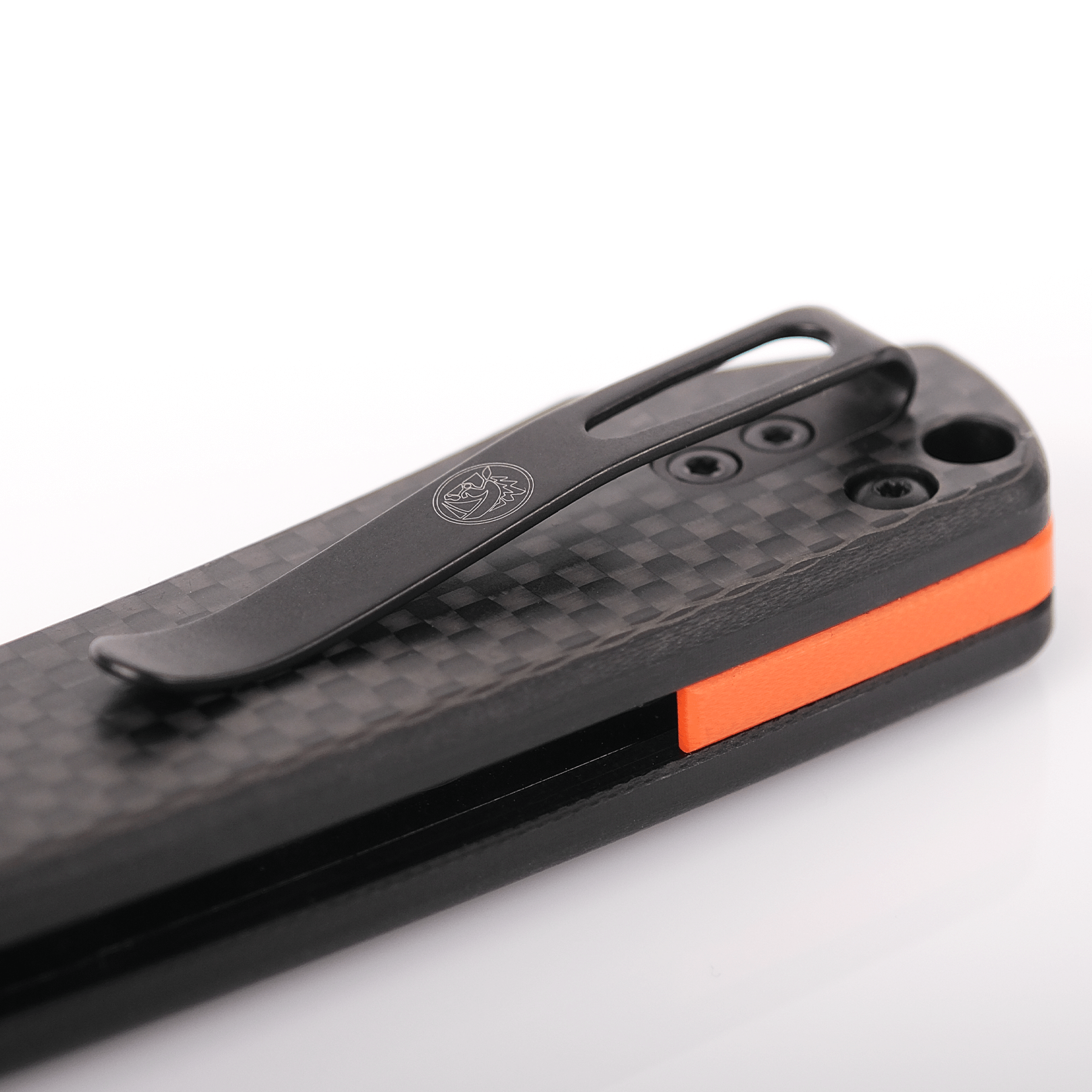Vosteed Raccoon knife detail, pocket clip and carbon fiber handle