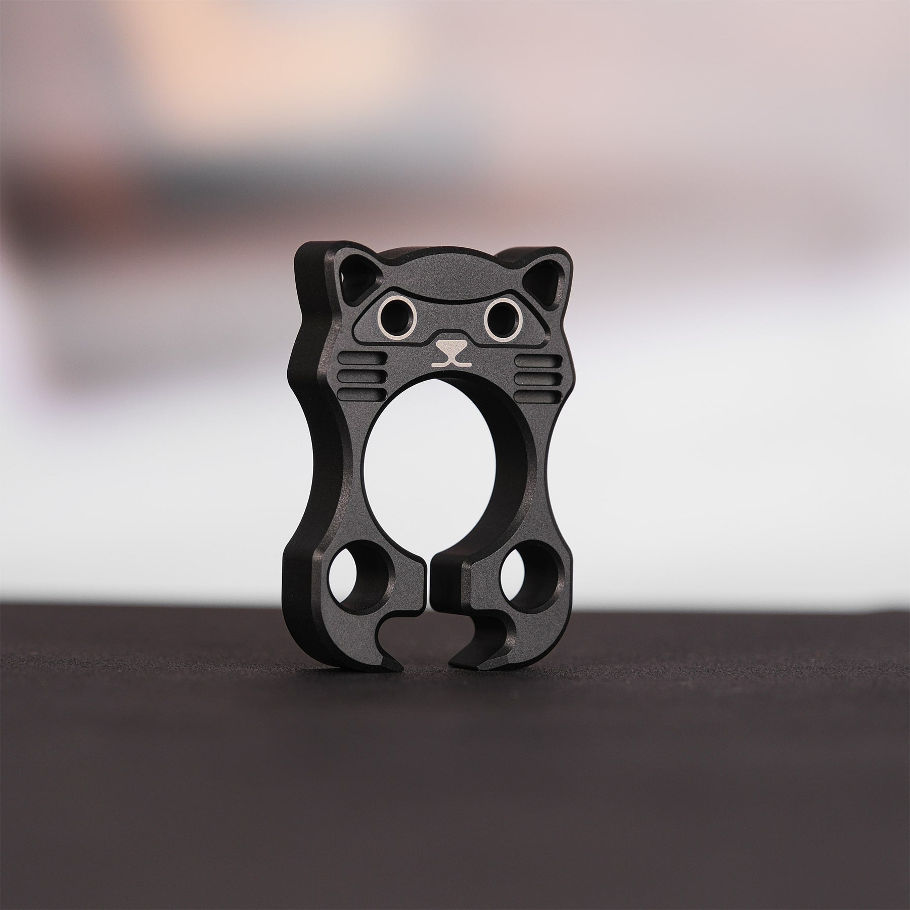 Raccoon Bottle Opener by Vosteed, black titanium