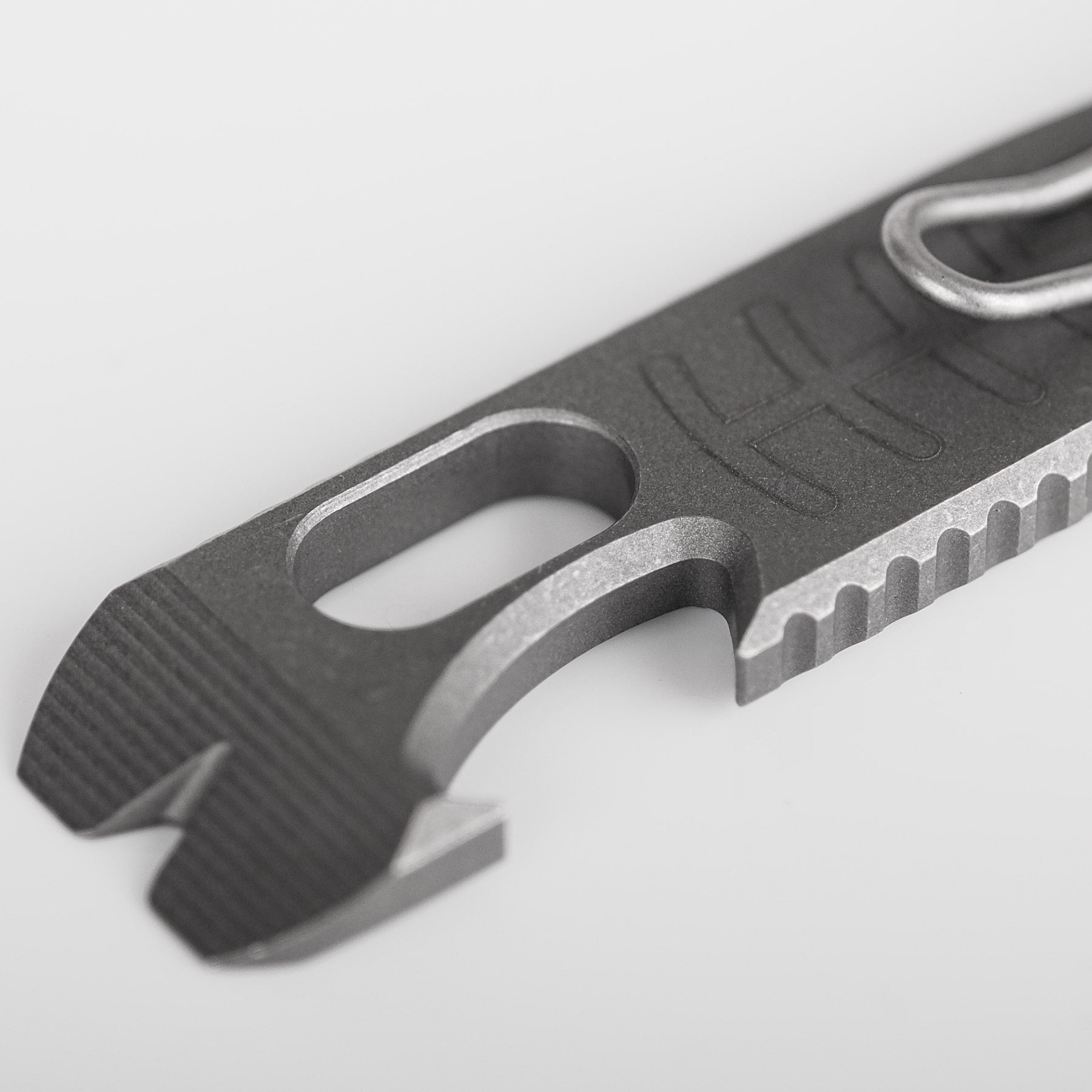 Vosteed Shark Bomb Prybar detail: Bottle opener and jimping