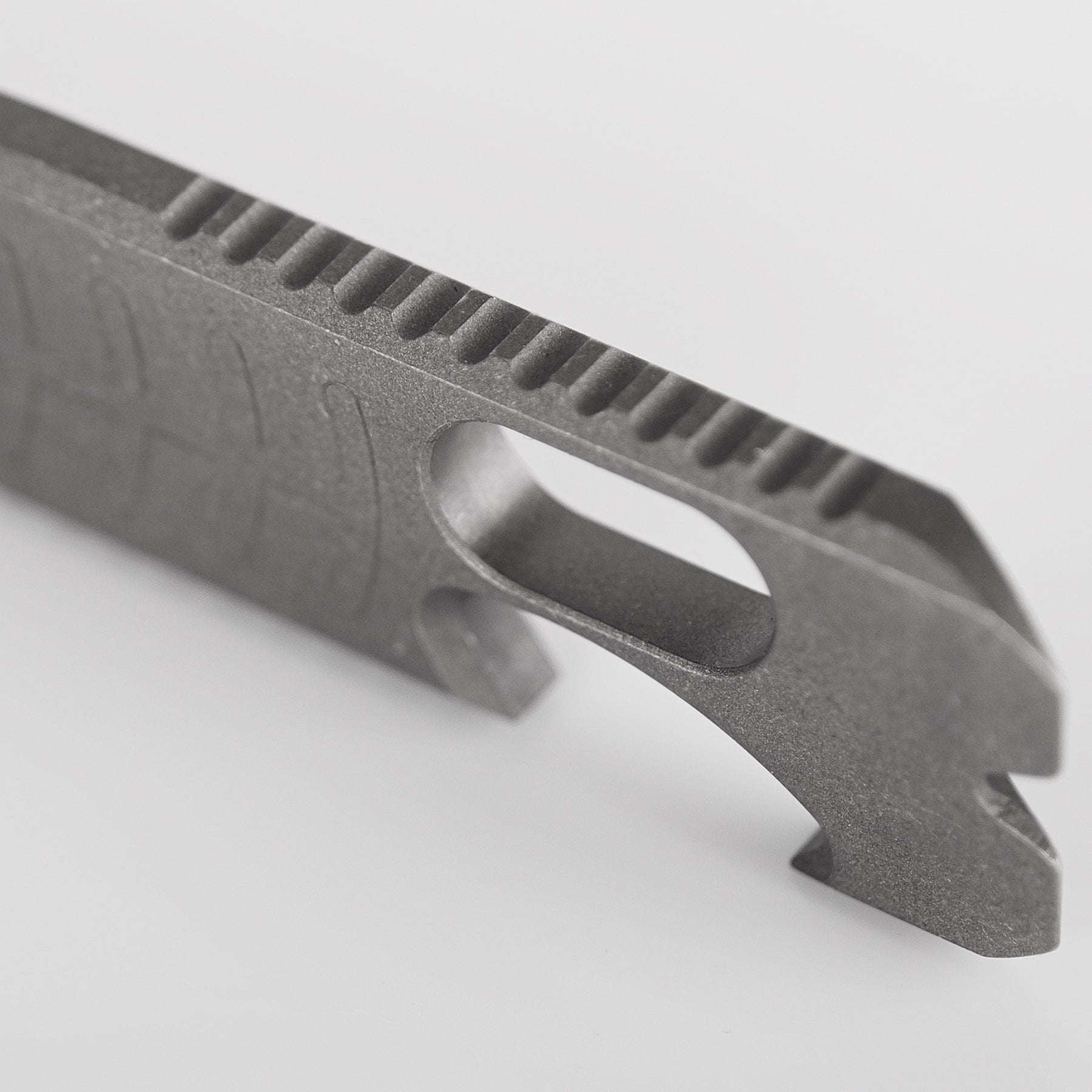 Vosteed Shark Bomb Prybar detail: bottle opener and jimping