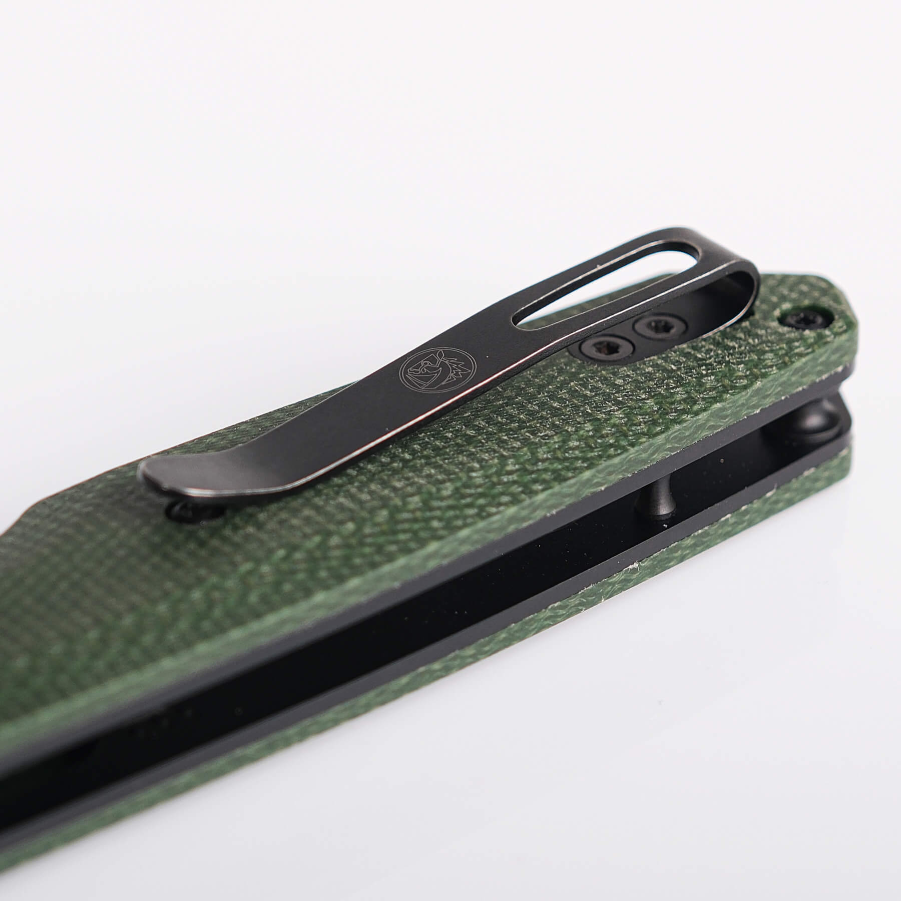 Vosteed Tala knife detail: Green Micarta handle and pocket clip