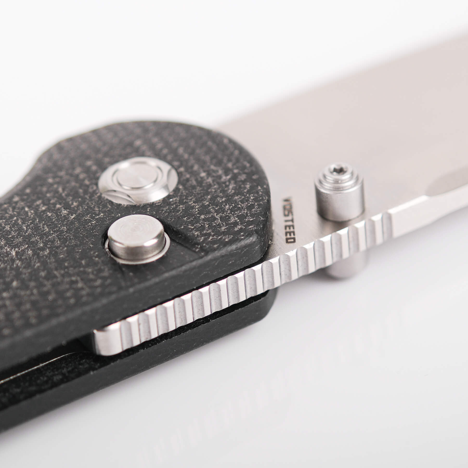 Vosteed Thornton knife detail, Trek Lock mechanism, blade, and handle