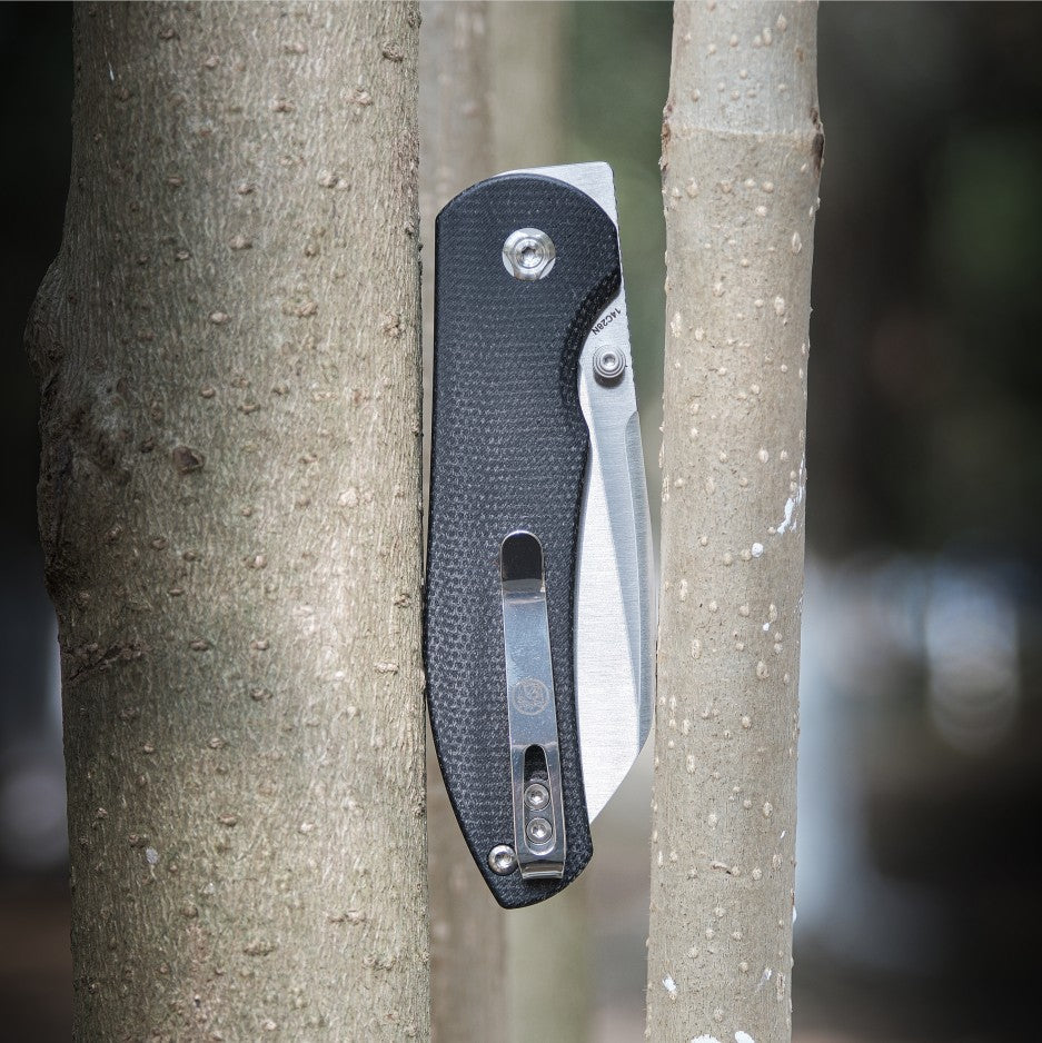 Vosteed Thornton Trek Lock knife clipped on tree trunk
