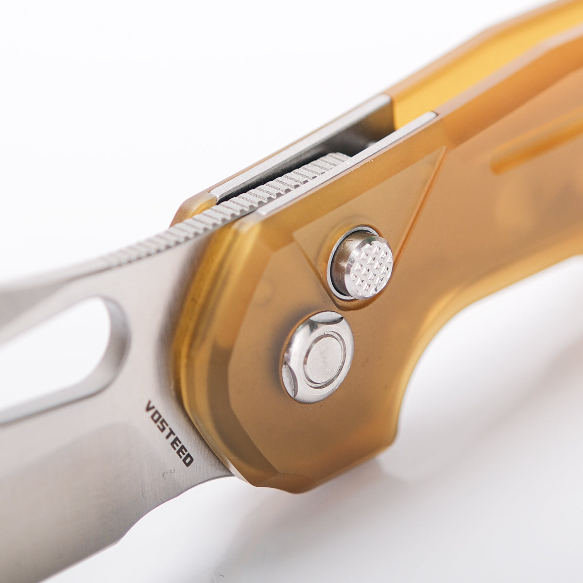 Vosteed Thunderbird knife, close up of button and lock detail