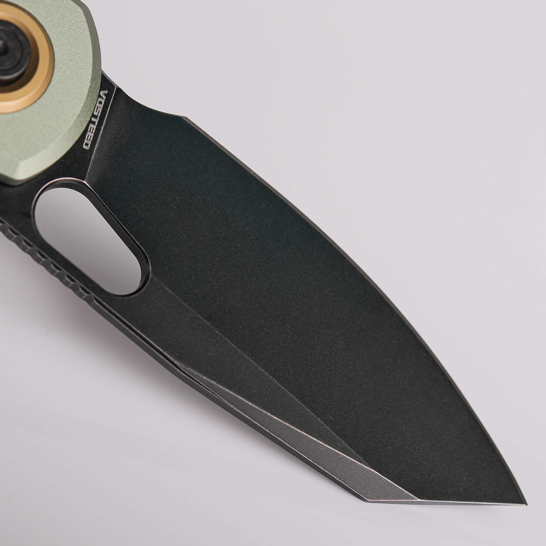 Vosteed Ankylo knife, close-up of the black Elmax blade.