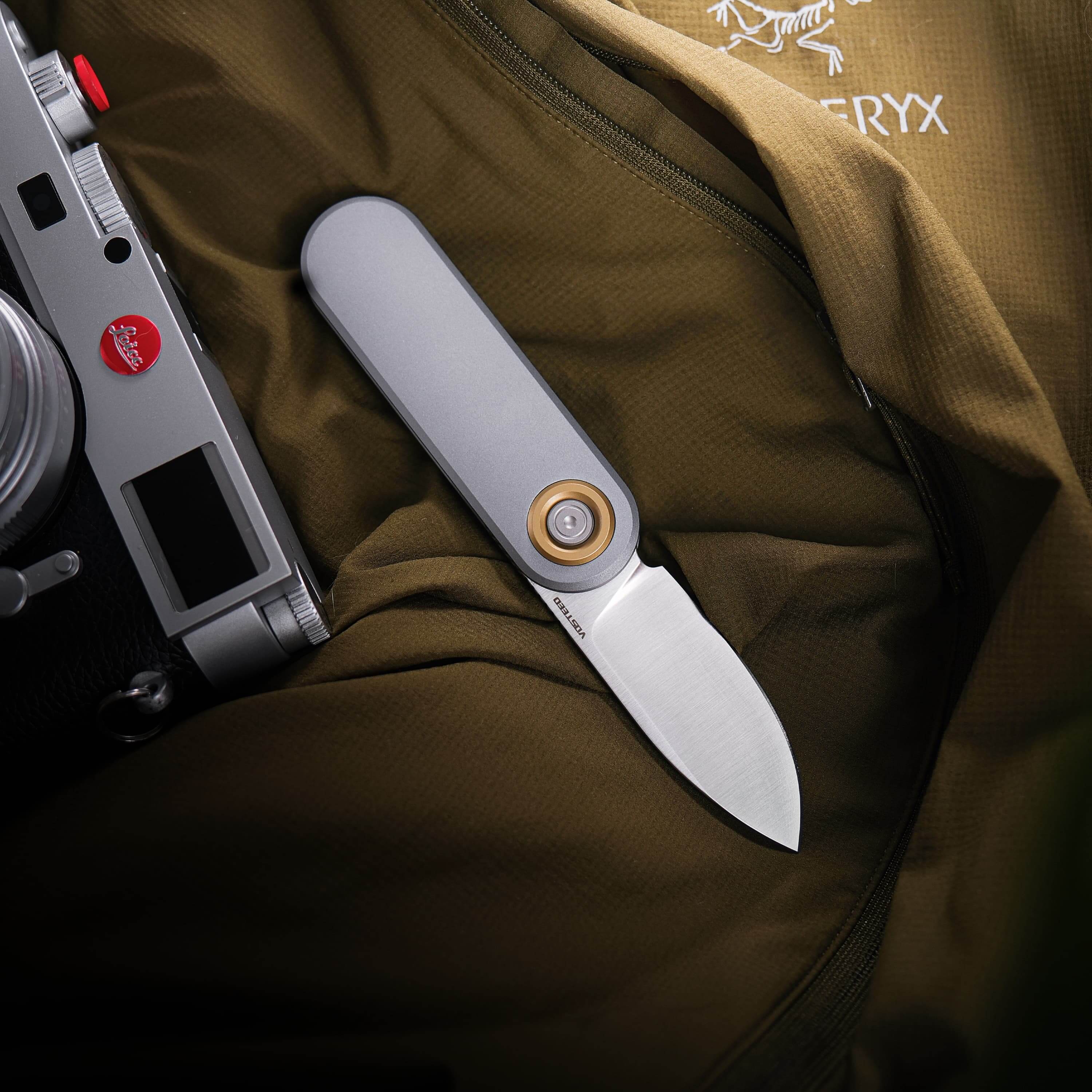 Vosteed Corgi V knife and Leica camera, EDC gear.