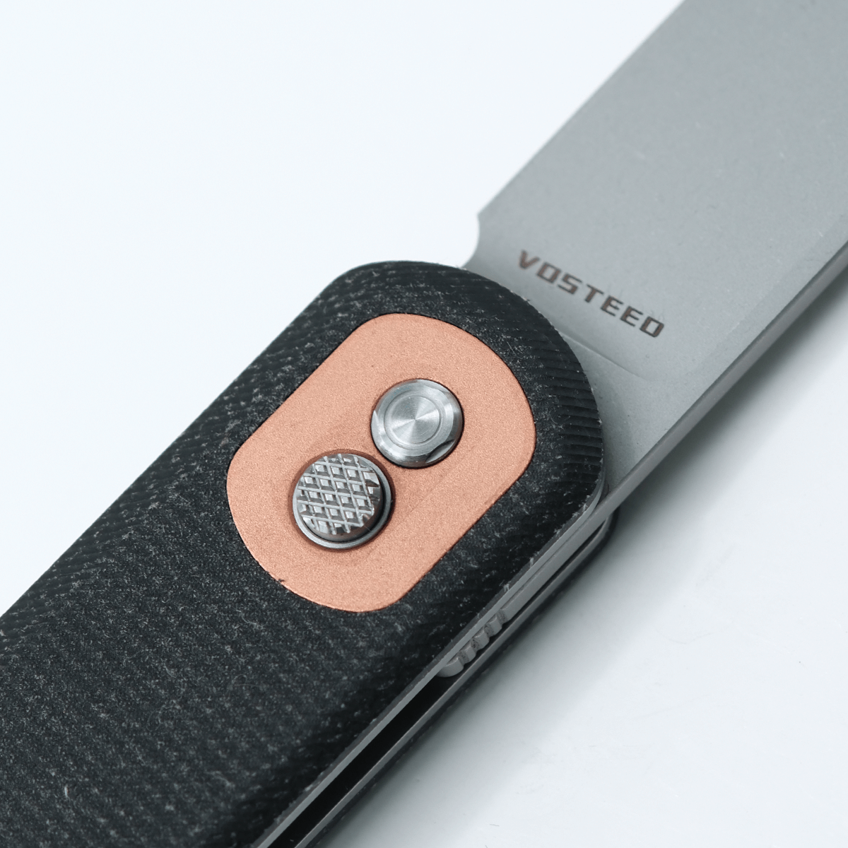 Vosteed Corgi knife Trek Lock mechanism, micarta handle, copper insert
