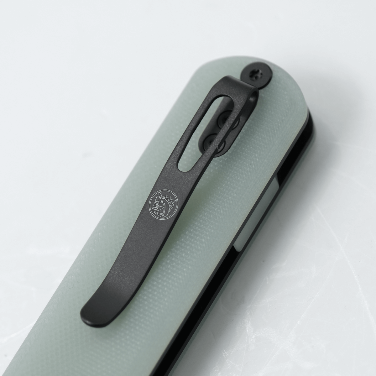 Vosteed Corgi knife detail, black pocket clip on jade G10 handle