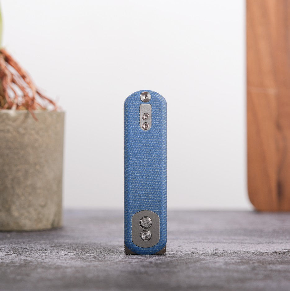 Corgi Pup Knife blue Micarta handle detail, Trek Lock mechanism