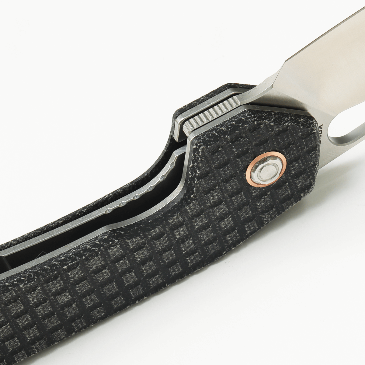 Vosteed Gator knife handle detail: Micarta, copper pivot ring