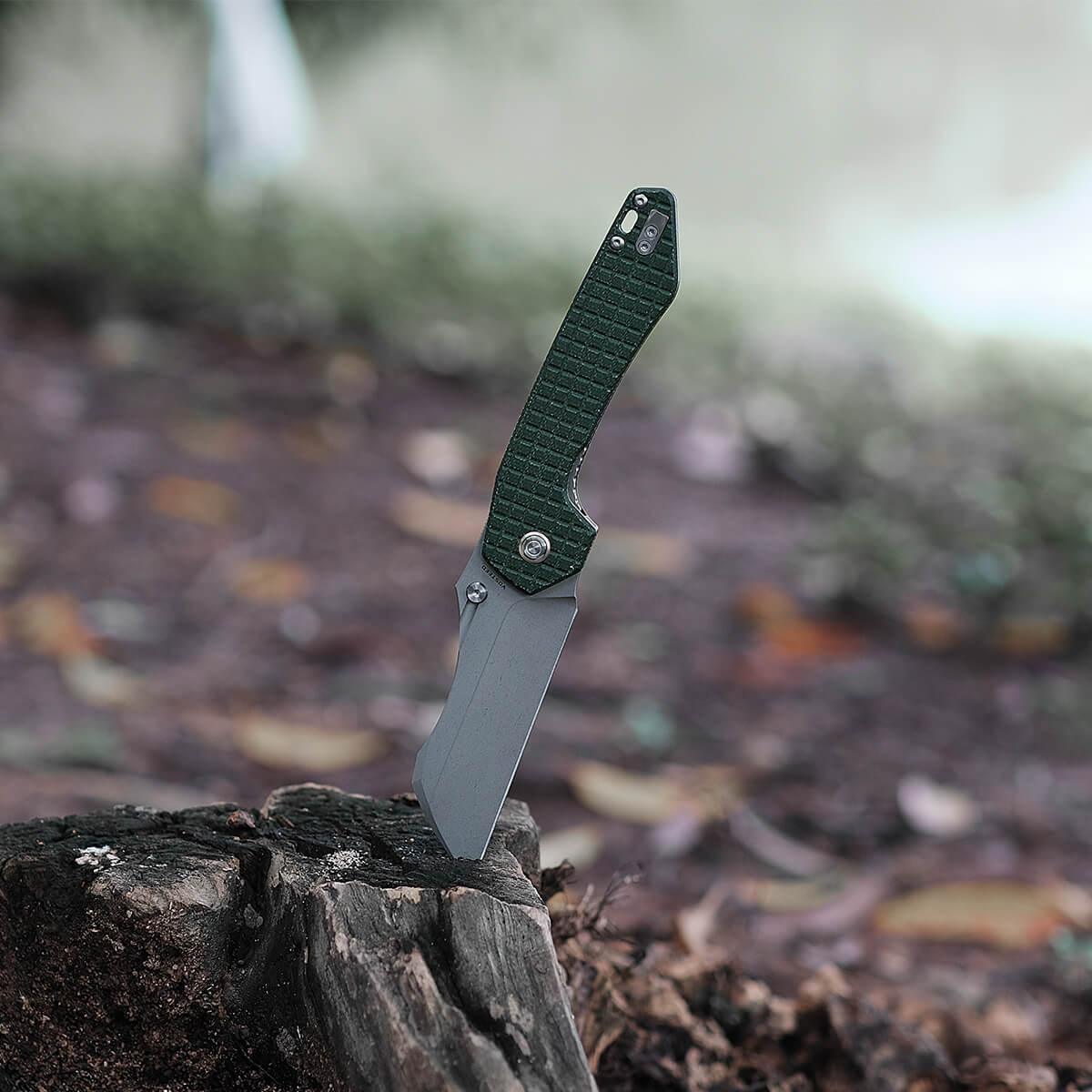 Vosteed Gator Knife with Wharncliffe blade on wood