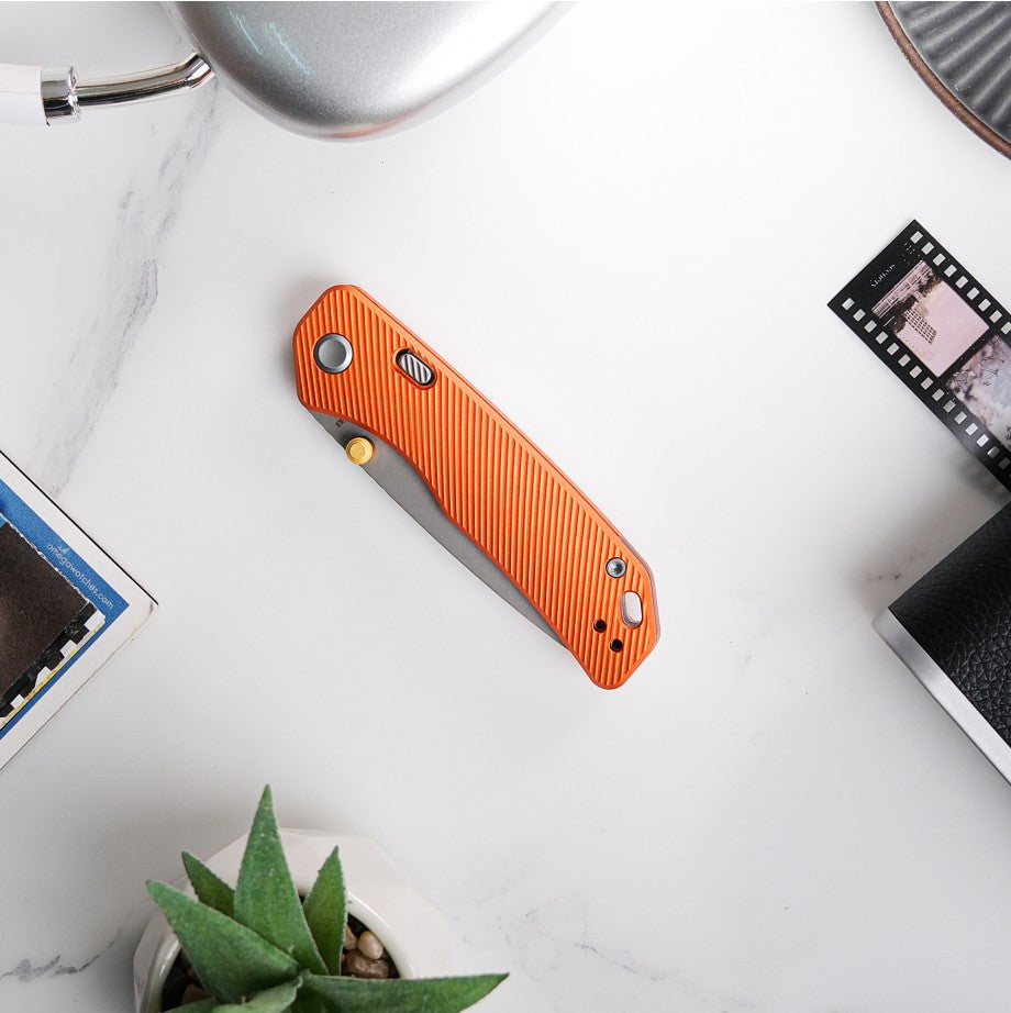 Vosteed Marten knife with orange handle, product shot