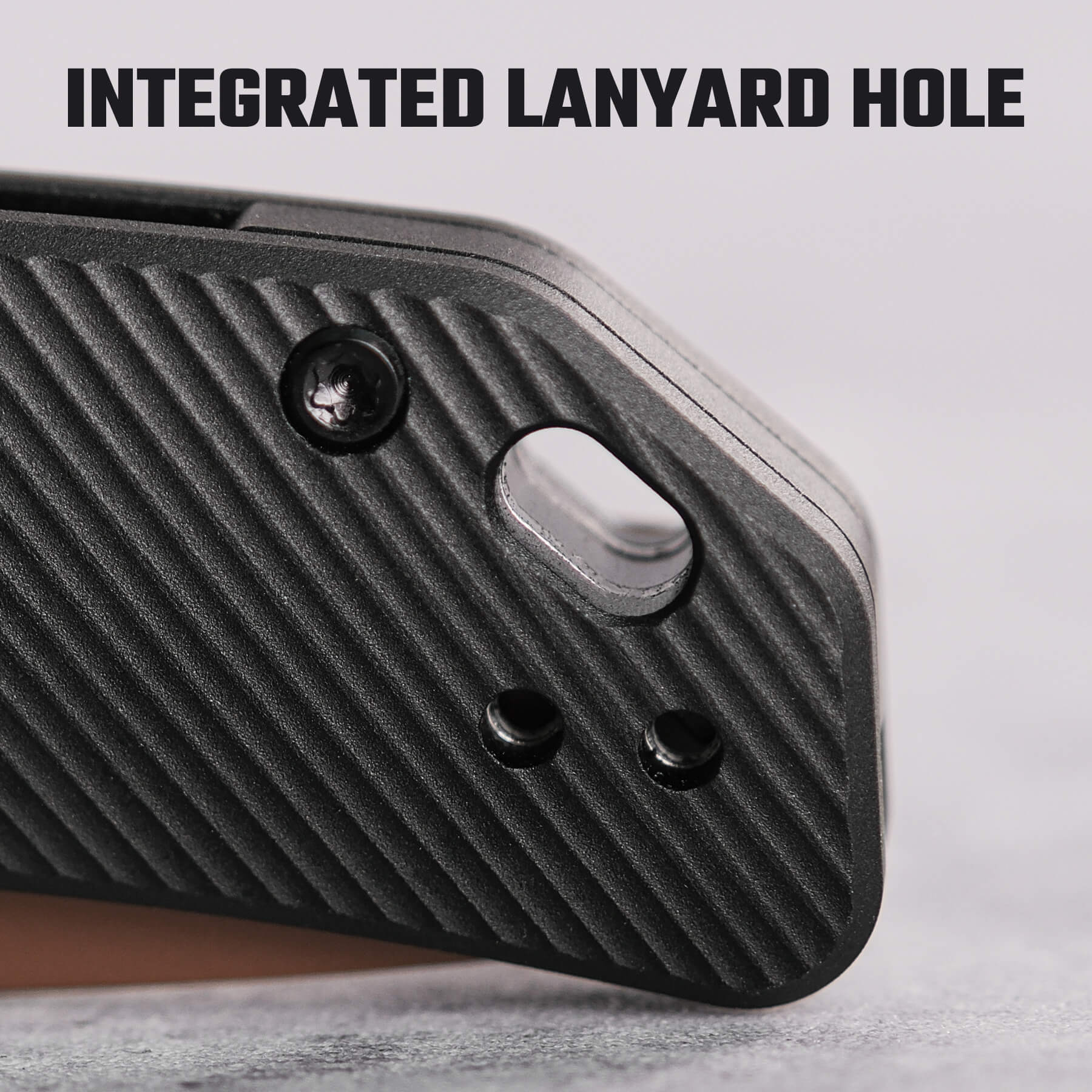 Vosteed Marten knife integrated lanyard hole detail