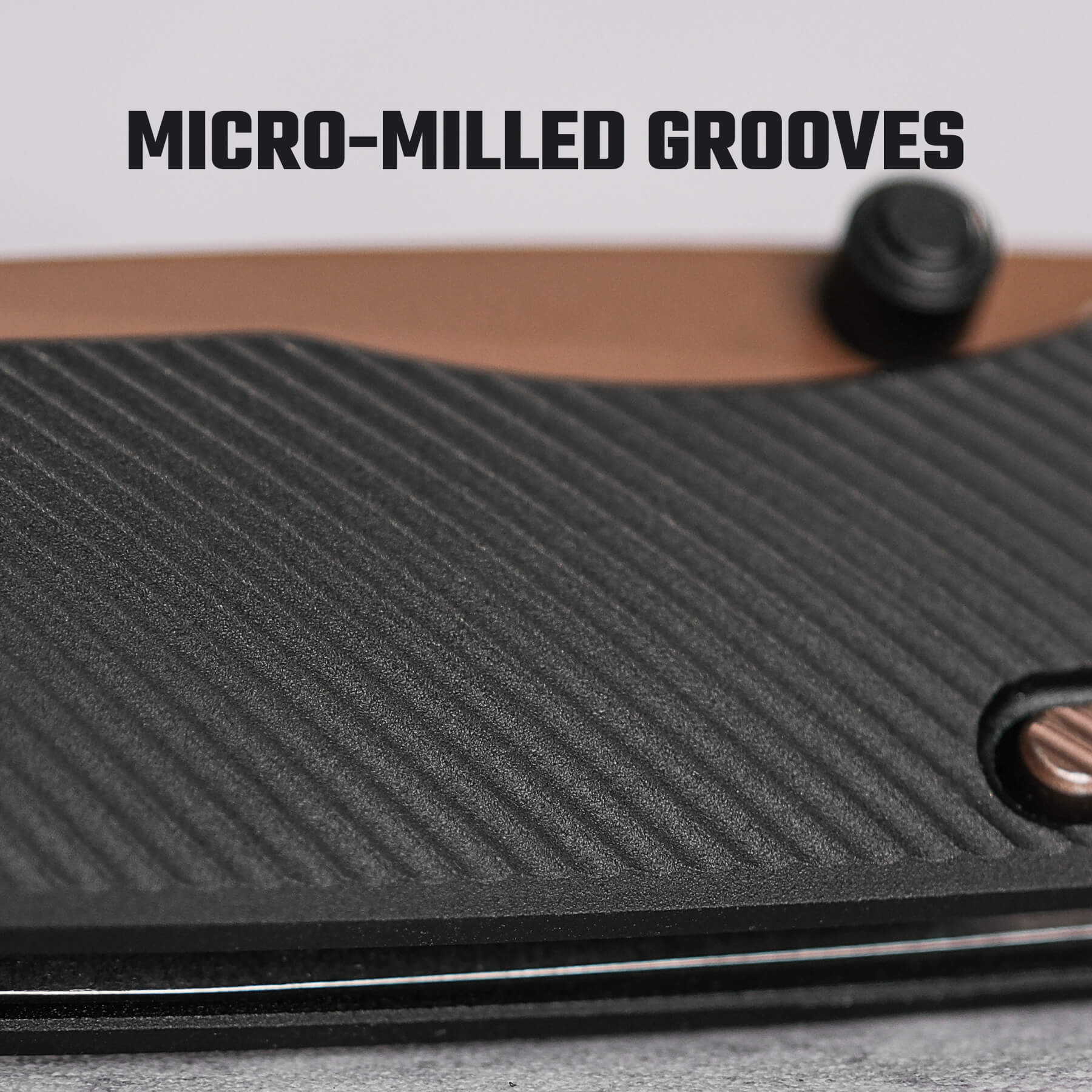 Vosteed Marten knife handle detail, micro-milled grooves, non-slip grip