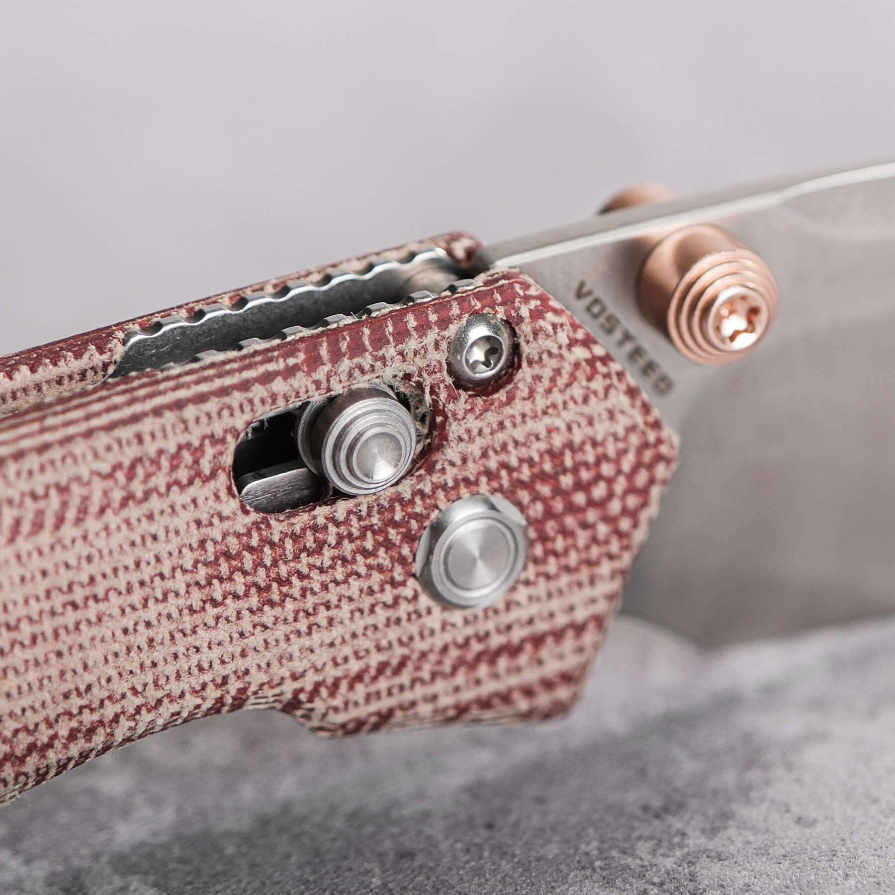 Vosteed Mini Psyop Red Micarta Close-up