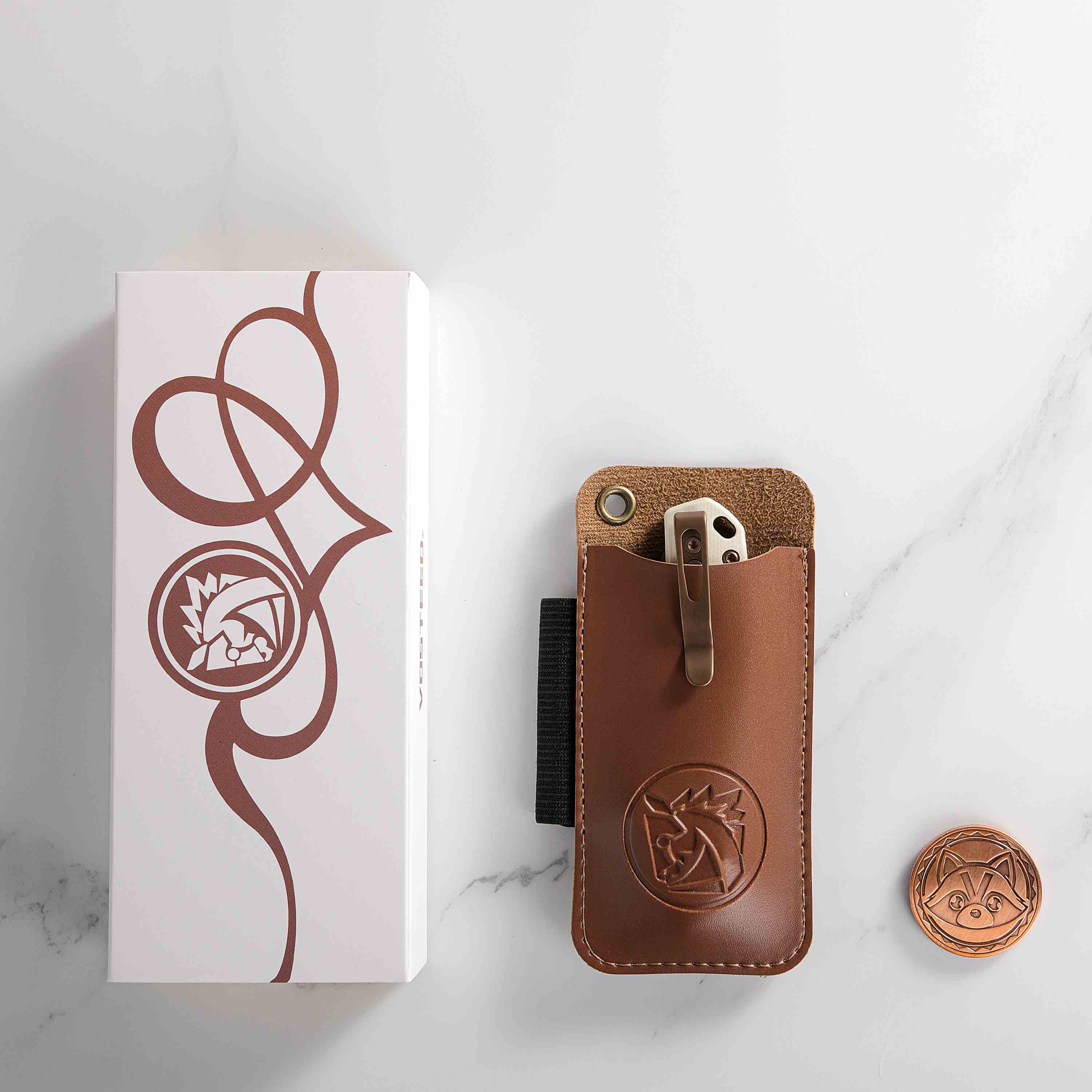 Vosteed Mini Psyop knife set, including leather sheath and coin