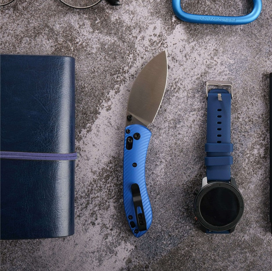Vosteed Mini Nightshade EDC knife with watch, notepad, and accessories.