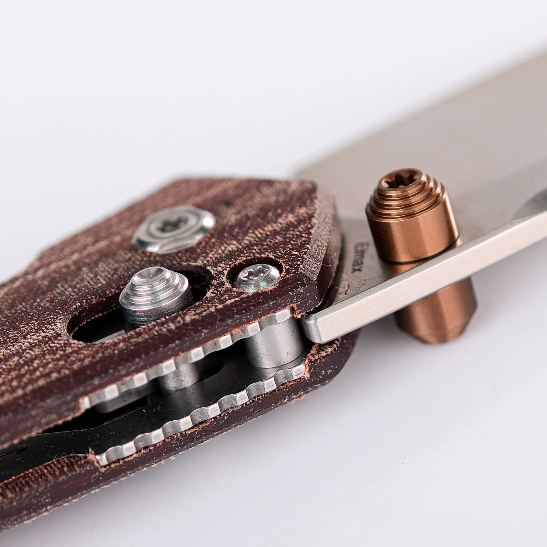Mini Psyop knife detail: Elmax blade, Micarta handle, copper thumb stud