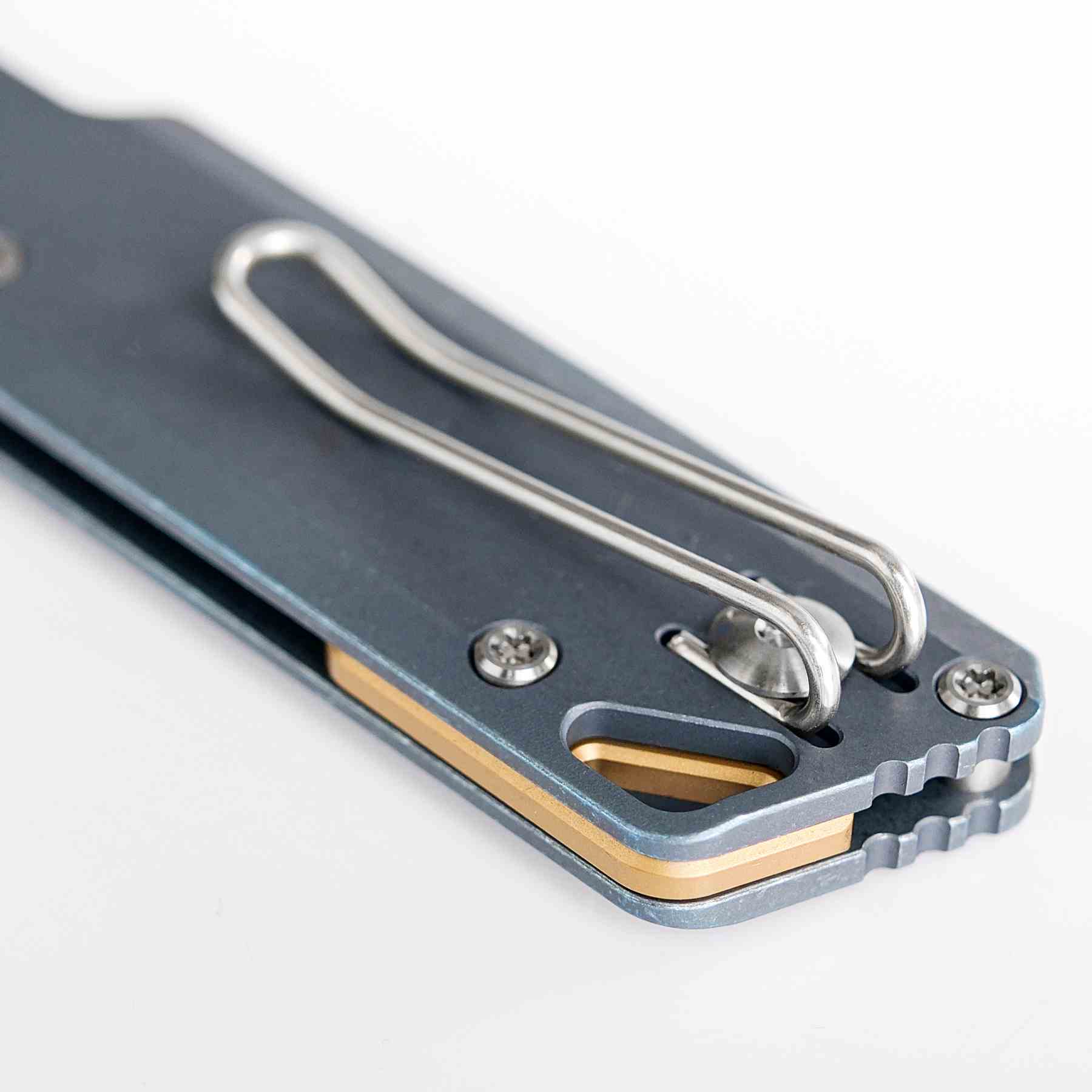 Vosteed Parallel knife blue titanium handle and pocket clip detail