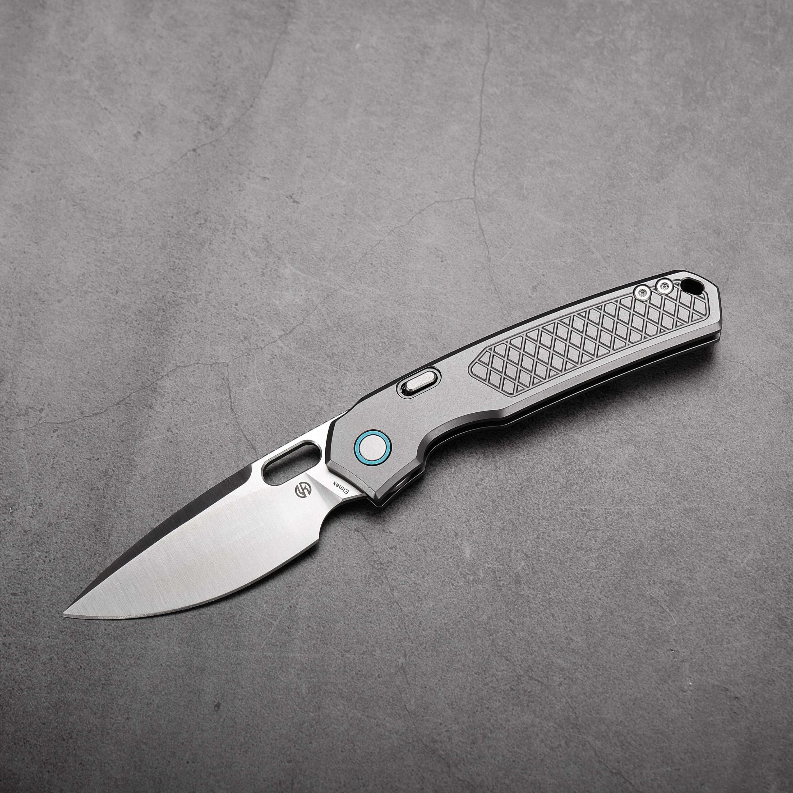 Vosteed Psyop knife with gray titanium handle and Elmax blade