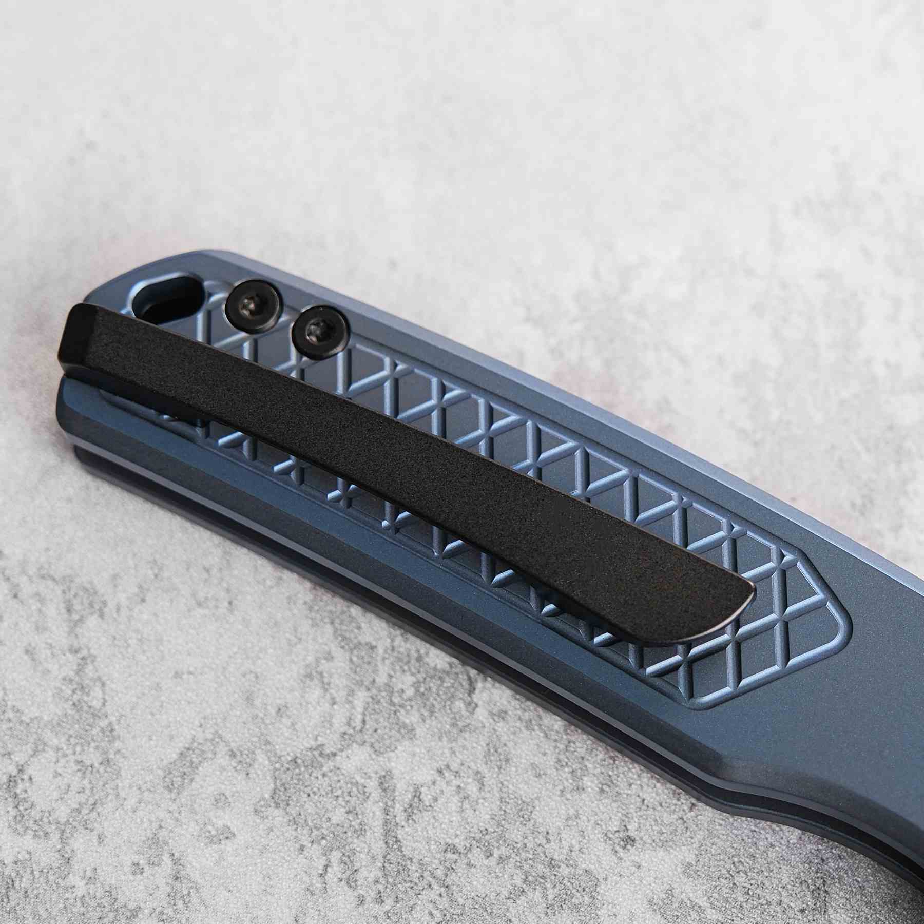 Vosteed Psyop blue titanium handle pocket clip detail